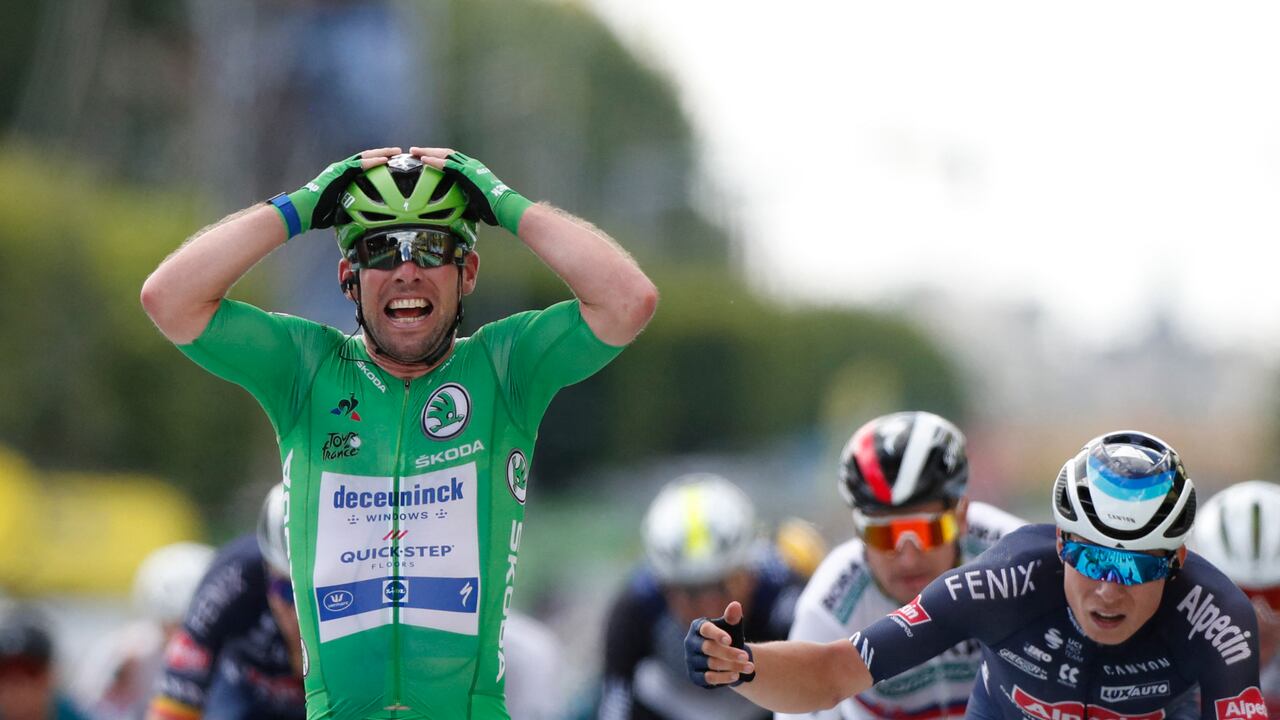 Team Deceuninck Quickstep's Mark Cavendish of Great Britain celebrates as he crosses the finish line of the 6th stage of the 108th edition of the Tour de France cycling race, 160 km between Tours and Chateauroux, on July 01, 2021. (Photo by Guillaume Horcajuelo / POOL / AFP)