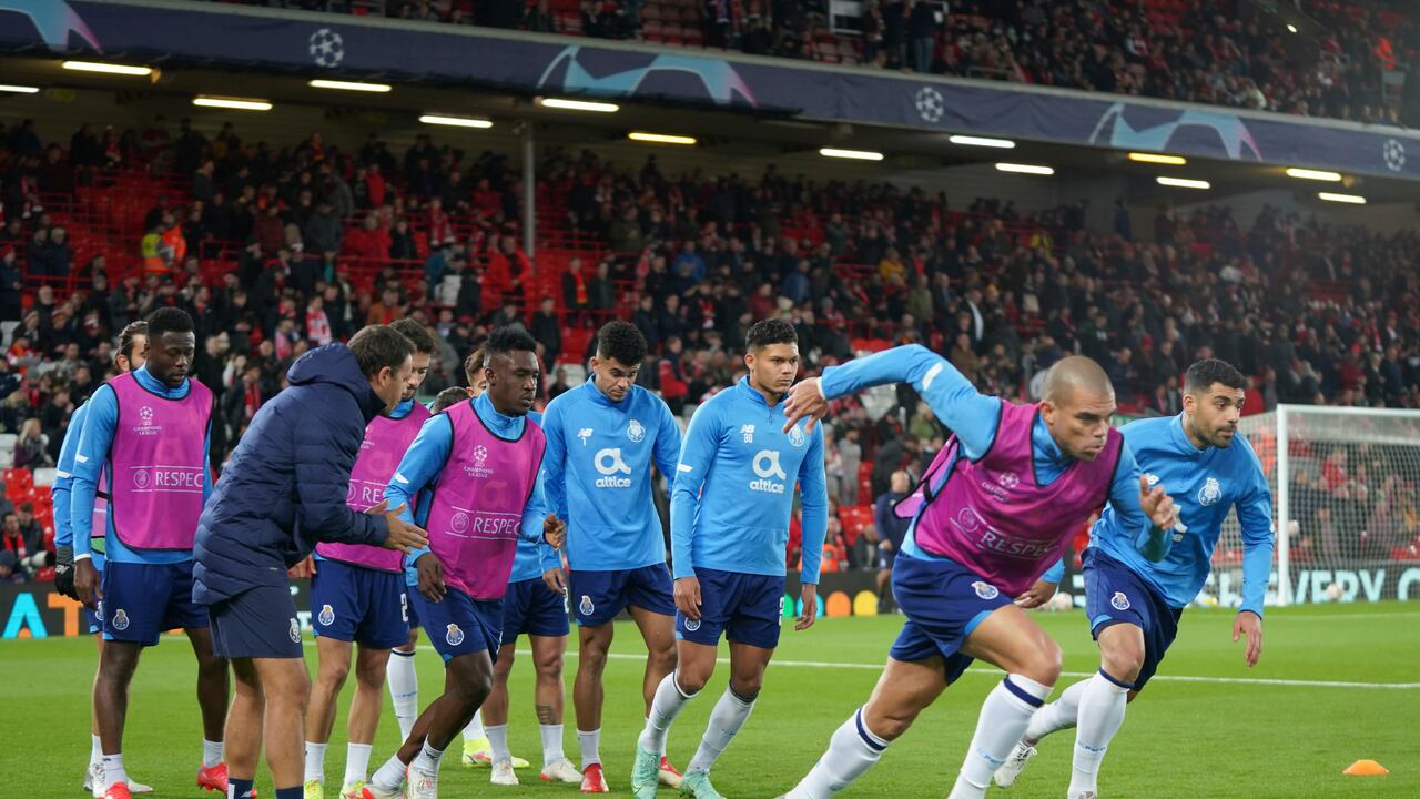 Porto players warm up ahead of the Champions League group B soccer match between Liverpool and FC Porto at Anfield stadium in Liverpool, Wednesday, Nov. 24, 2021. (AP Photo/Jon Super)