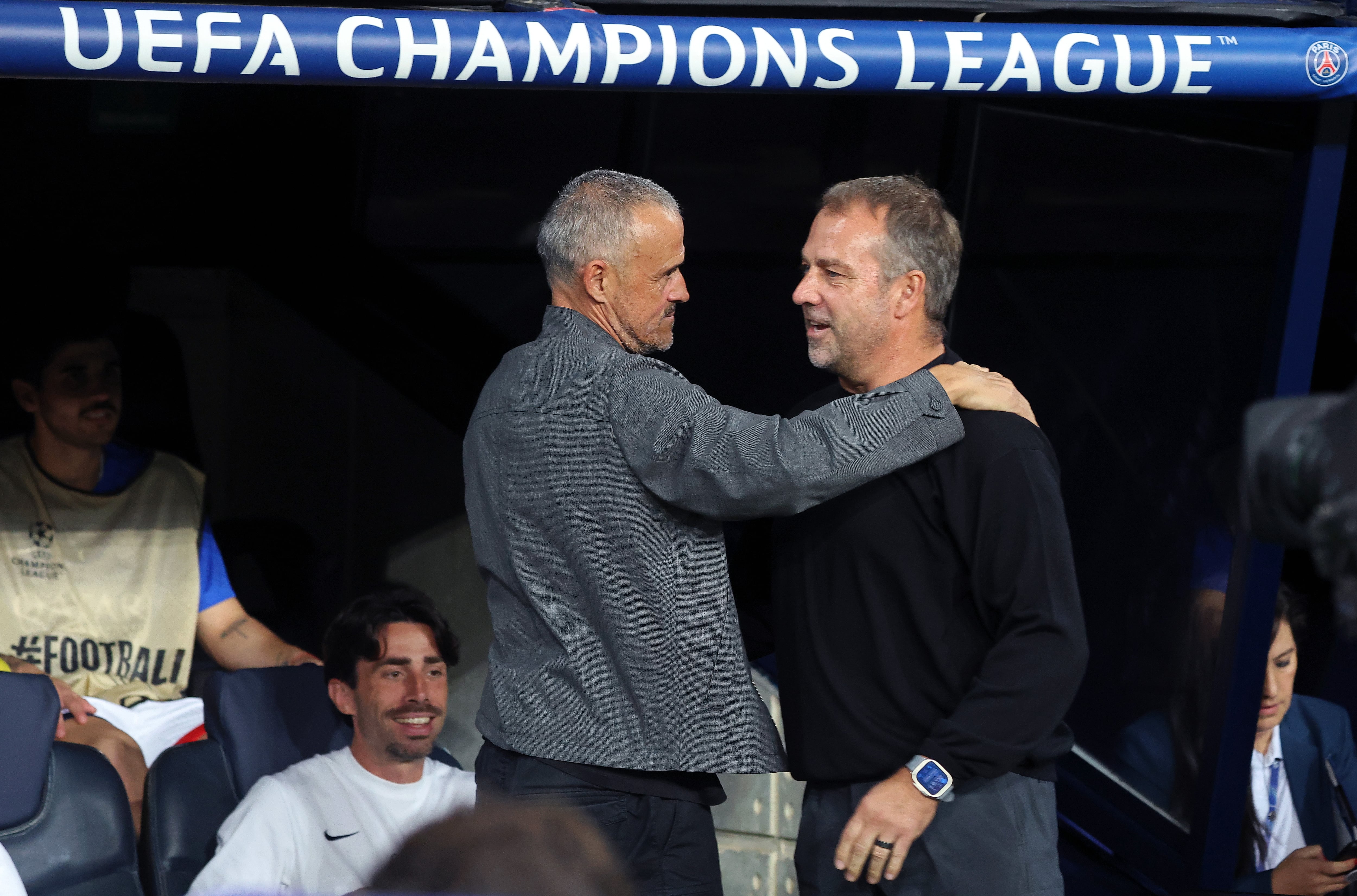 Luis Enrique Martinez and Hansi Flick greet each other before the start of the match between FC Barcelona and Paris Saint-Germain FC, corresponding to Matchday 2 of the League phase of the UEFA Champions League, at the Lluis Companys Stadium in Barcelona, Spain, on October 1, 2025. (Photo by Joan Valls/Urbanandsport/NurPhoto via Getty Images) -- (Photo by Urbanandsport/NurPhoto via Getty Images)