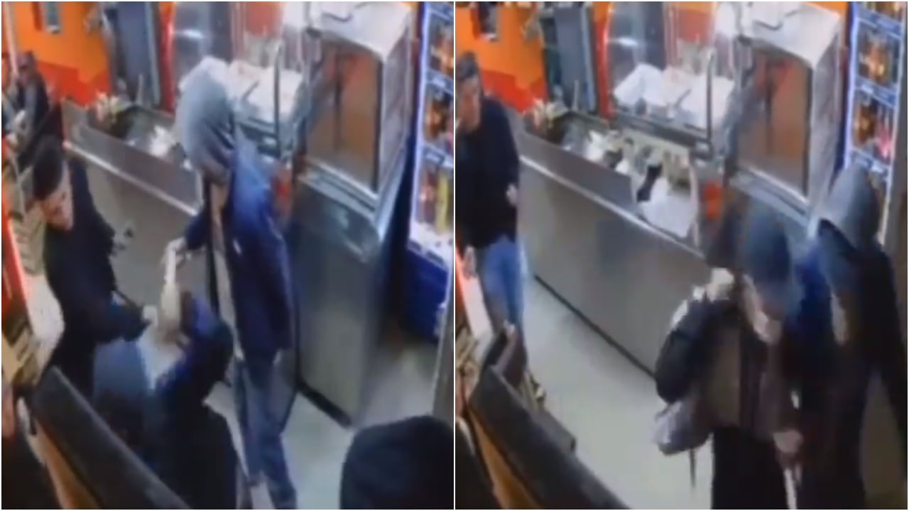 Momento en que delincuentes con puñal atracan un restaurante.