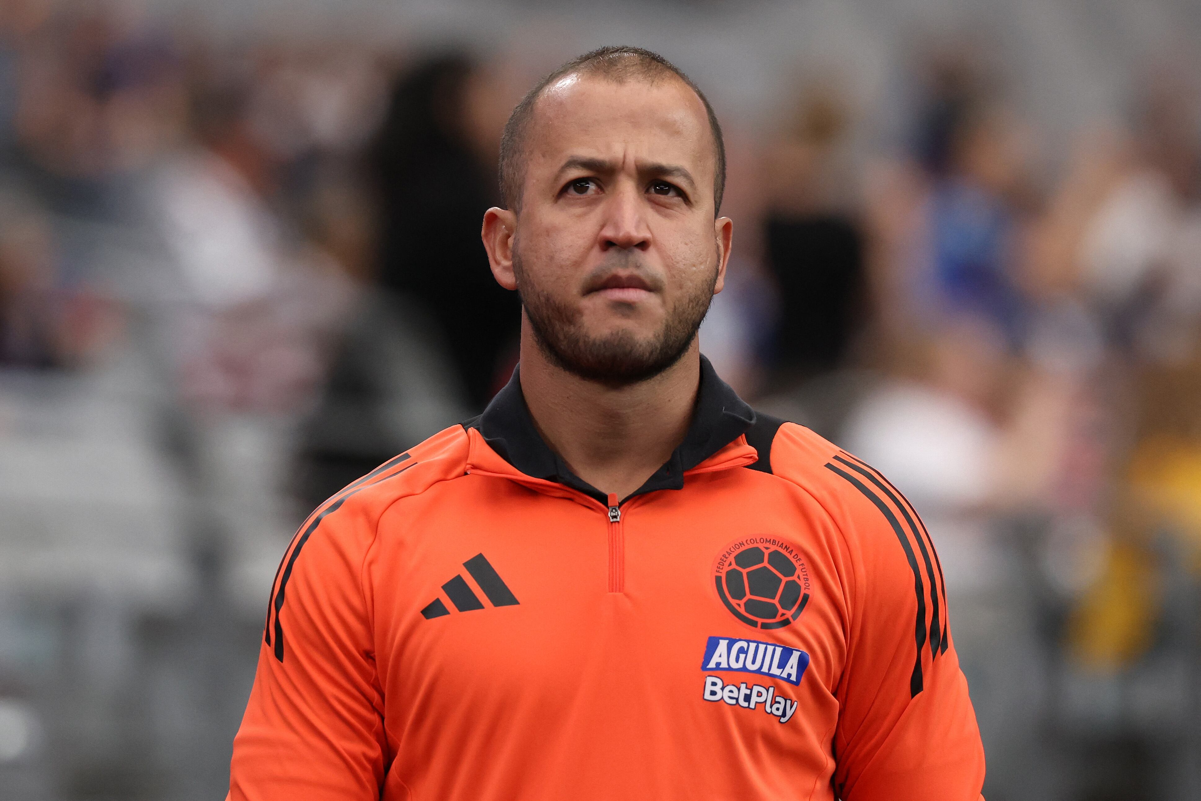 GLENDALE, ARIZONA - FEBRUARY 23: Head coach Angelo Marsiglia of Colombia looks on during the first half of the 2025 SheBelieves Cup match against Japan at State Farm Stadium on February 23, 2025 in Glendale, Arizona. Chris Coduto/Getty Images/AFP (Photo by Chris Coduto / GETTY IMAGES NORTH AMERICA / Getty Images via AFP)