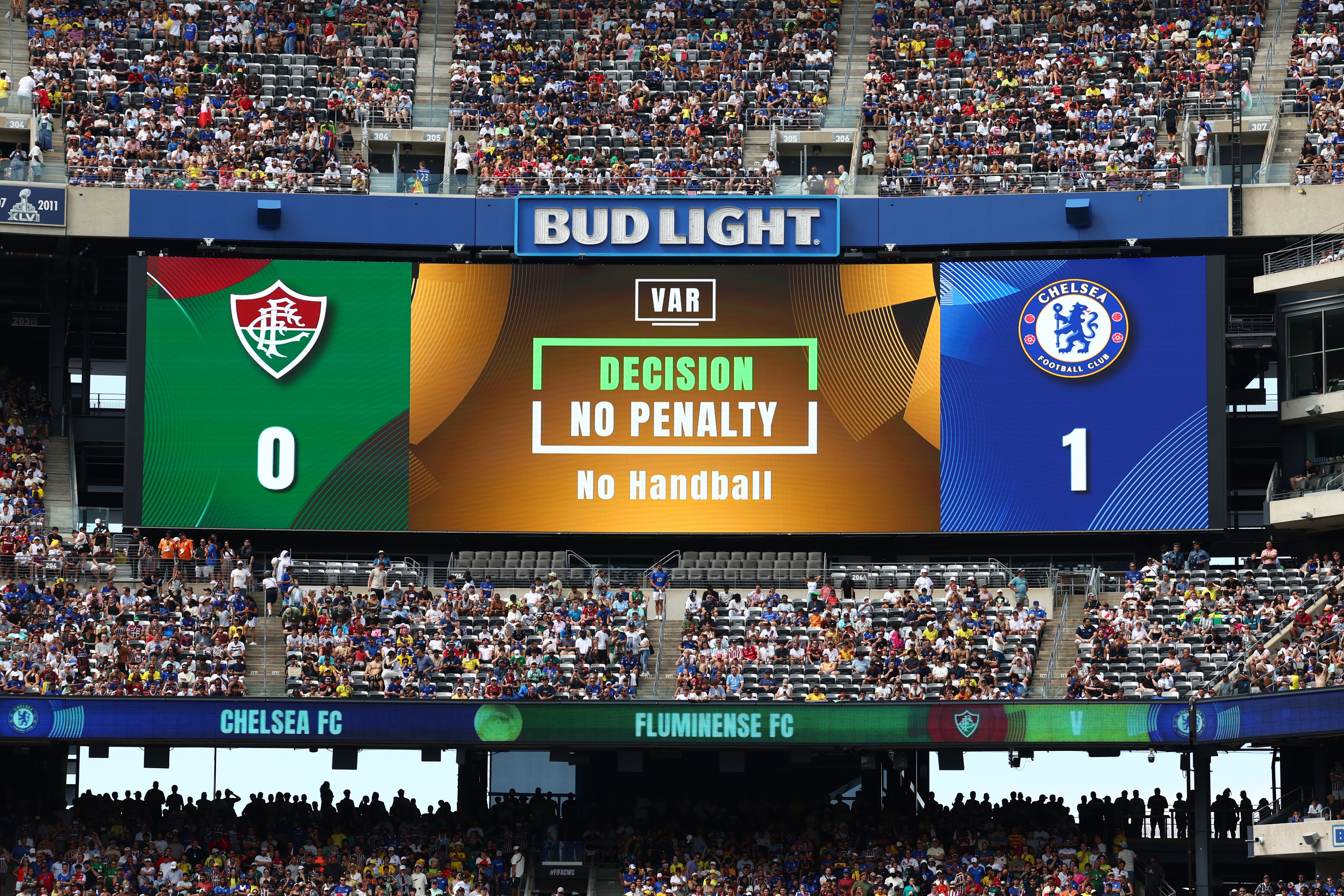 EAST RUTHERFORD, NEW JERSEY - JULY 8:  General View of the scoreboard / big screen after Trevor Chalobah of Chelsea handballed in the penalty box which was ruled out for a penalty after a VAR check during the FIFA Club World Cup 2025 semi-final match between Fluminense FC and Chelsea FC at MetLife Stadium on July 8, 2025 in East Rutherford, United States. (Photo by Chris Brunskill/Fantasista/Getty Images)