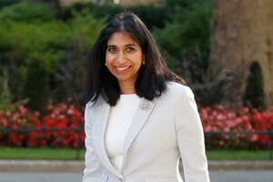 (FILES) In this file photo taken on July 21, 2020 Britain's Attorney General Suella Braverman walks through Downing Street in central London to participate in the first 'in person' cabinet meeting since England's first coronavirus lockdown, at the Foreign and Commonwealth Office. - The British government's most senior legal adviser on March 2, 2021, became the first Cabinet minister to go on maternity leave, following a change in the law. The Attorney General for England and Wales, Suella Braverman, said she was "excited about making a little bit of history" to become the first "minister on leave", calling it "a landmark moment for the UK government". (Photo by Tolga AKMEN / AFP)