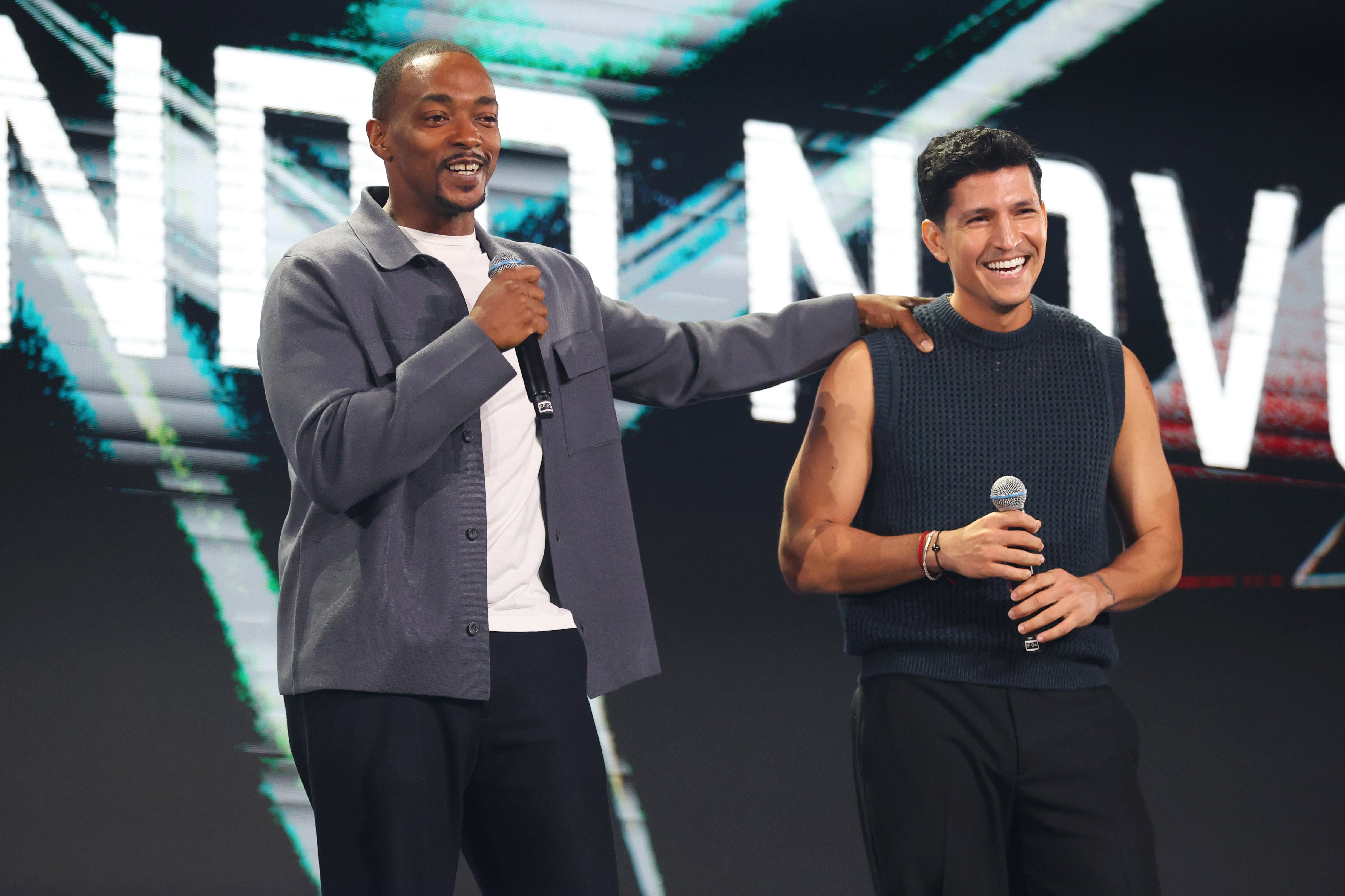SAO PAULO, BRAZIL - NOVEMBER 09: Captain America stars Anthony Mackie and Danny Ramirez speak during Day 2 of the D23 Brazil: A Disney Experience at Transamerica Expo Center on November 09, 2024 in Sao Paulo, Brazil.  (Photo by Ricardo Moreira/Getty Images for Disney)
