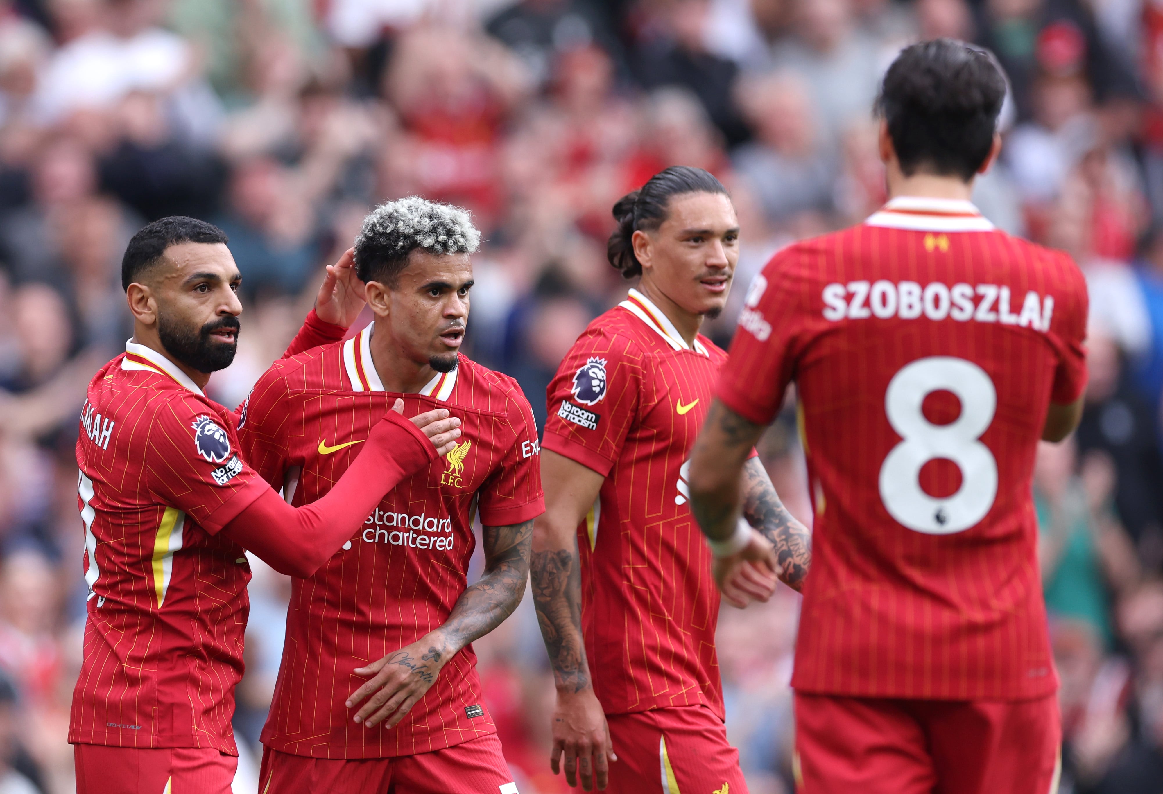 LIVERPOOL, ENGLAND - SEPTEMBER 21: Luis Diaz of Liverpool celebrates with Mohamed Salah after scoring his team's second goal during the Premier League match between Liverpool FC and AFC Bournemouth at Anfield on September 21, 2024 in Liverpool, England. (Photo by Alex Livesey/Getty Images)