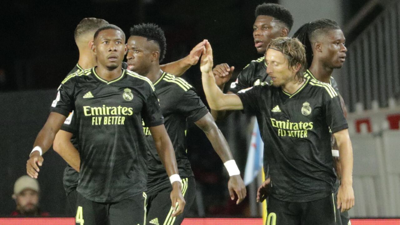 Real Madrid's Luka Modric, right, celebrates with teammates after scoring his side's second goal during a Spanish La Liga soccer match between Celta Vigo and Real Madrid at the Balaidos stadium in Vigo, Spain, Saturday, Aug. 20, 2022. (AP/Lalo R. Villar)