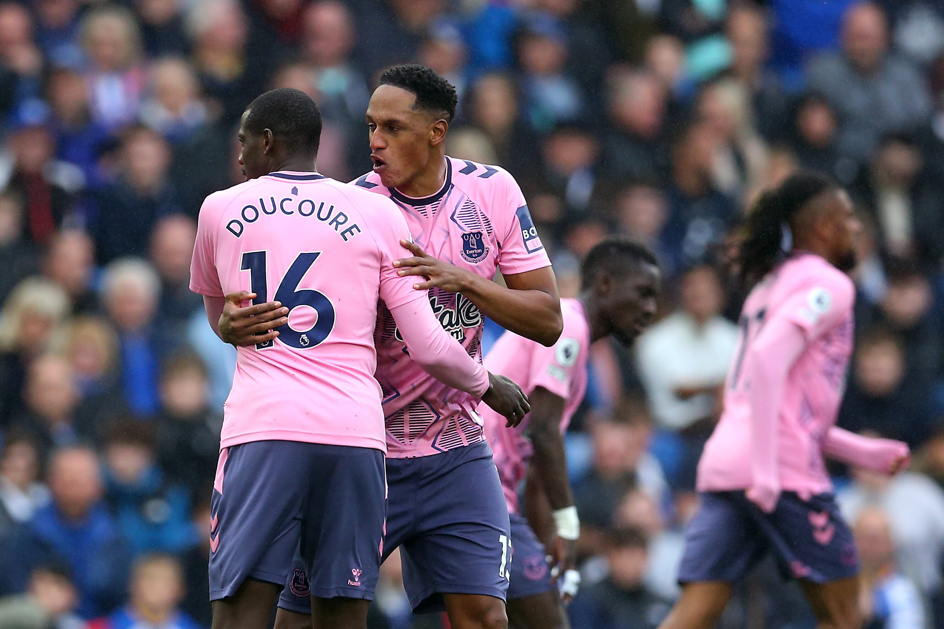 BRIGHTON, ENGLAND - MAY 08: Abdoulaye Doucoure of Everton celebrates with teammate Yerry Mina after scoring the team's first goal during the Premier League match between Brighton & Hove Albion and Everton FC at American Express Community Stadium on May 08, 2023 in Brighton, England. (Photo by Steve Bardens/Getty Images)