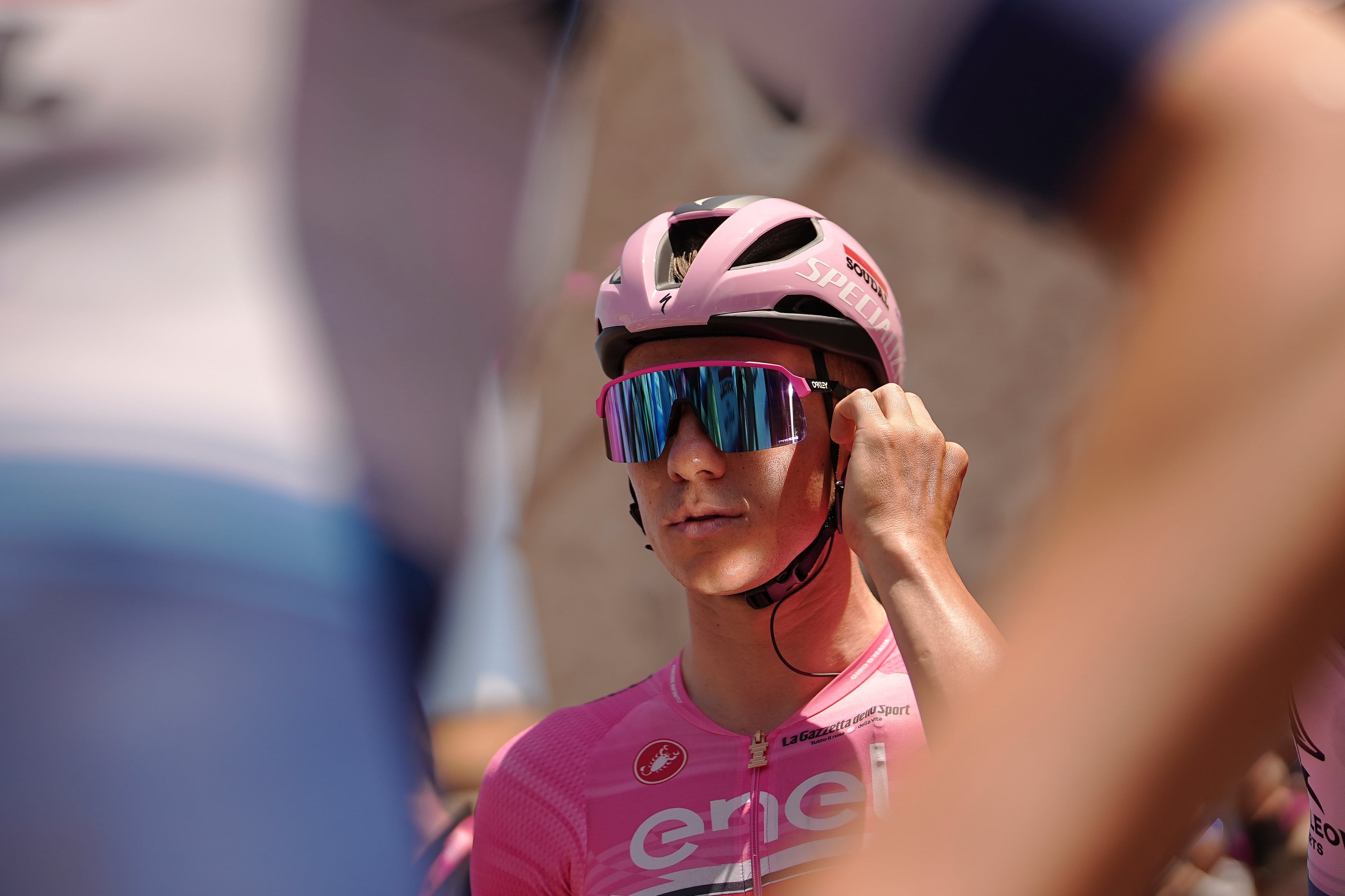 Remco Evenepoel, wearing the pink jersey of leader of the race, prepares for the start of the second stage of the Tour of Italy cycling race, from Teramo to San Salvo, in Teramo, Italy, Sunday, May 7, 2023. (Marco Alpozzi /LaPresse via AP)