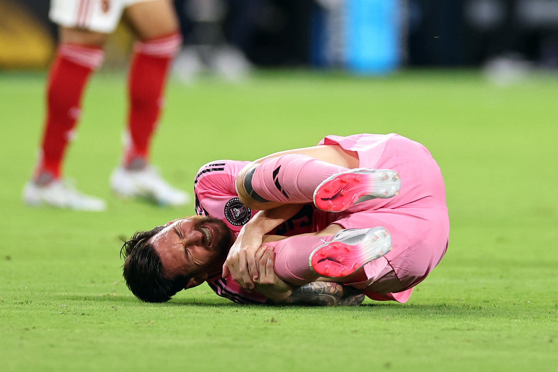 MIAMI GARDENS, FLORIDA - JUNE 14: Lionel Messi of Inter Miami CF reacts after being fouled during the FIFA Club World Cup 2025 group A match between Al Ahly SC and Internacional CF Miami at Hard Rock Stadium on June 14, 2025 in Miami Gardens, Florida. (Photo by Robbie Jay Barratt - AMA/Getty Images)