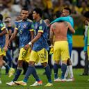 Players of Colombia leave the field after losing 1-0 against Brazil at the end of a qualifying soccer match for the FIFA World Cup Qatar 2022 at Neo Quimica Arena stadium in Sao Paulo, Brazil, Thursday, Nov.11, 2021. (AP Photo/Andre Penner)