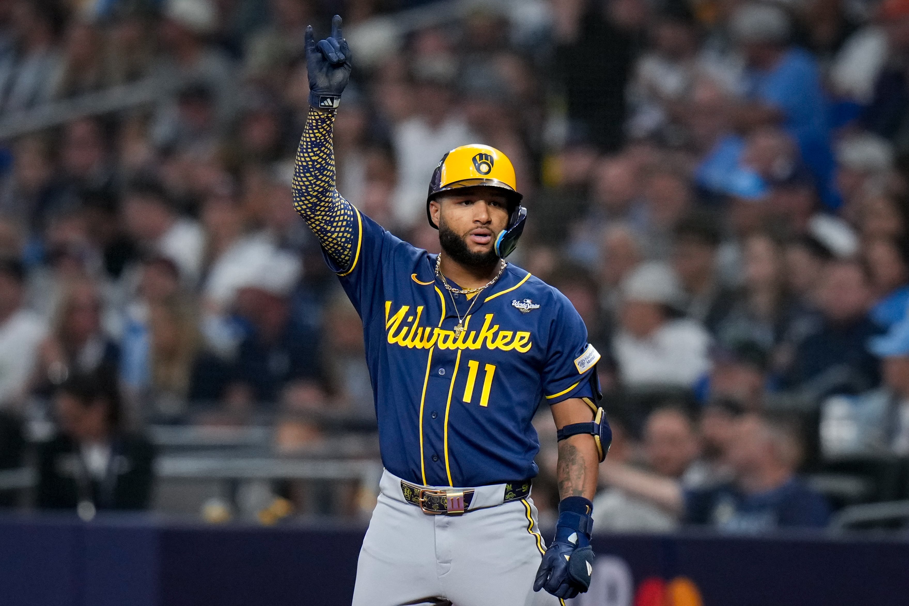 Milwaukee Brewers left fielder Jackson Chourio celebrates his base hit during the fifth inning of Game 3 of baseball's World Series, Monday, Oct. 26, 2026, in St. Petersburg, Fla., between the Milwaukee Brewers and the Tampa Bay Rays. (AP Photo/Chris O'Meara)