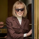 E. Jean Carroll, center, walks out of Manhattan federal court, Tuesday, May 9, 2023, in New York. A jury has found Donald Trump liable for sexually abusing the advice columnist in 1996, awarding her $5 million in a judgment that could haunt the former president as he campaigns to regain the White House. (AP Photo/John Minchillo)