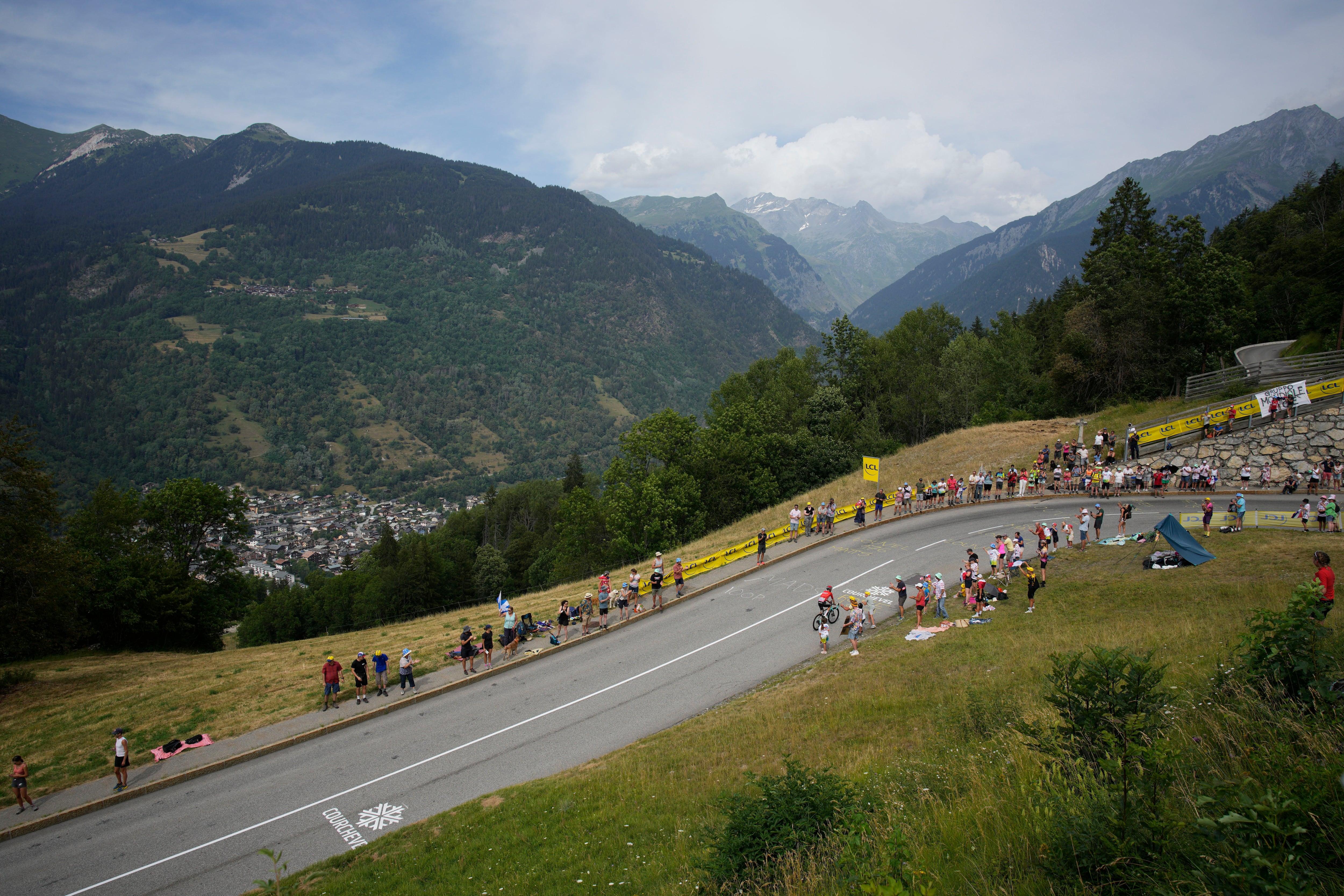 rance's Simon Guglielmi climbs towards Courchevel during the seventeenth stage of the Tour de France cycling race over 166 kilometers (103 miles) with start in Saint-Gervais Mont-Blanc and finish in Courchevel, France, Wednesday, July 19, 2023. (AP Photo/Daniel Cole)
