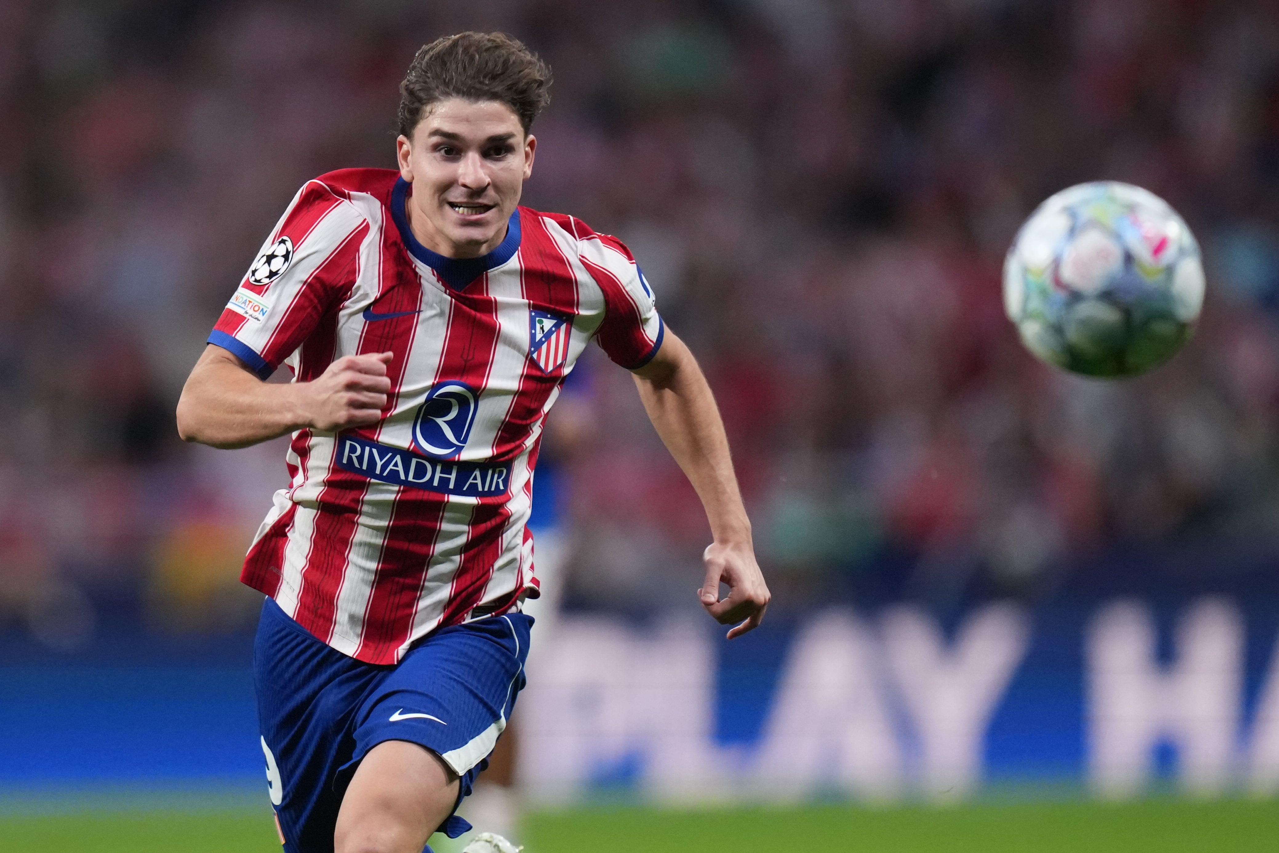 Atletico Madrid's Julian Alvarez is in action during the Champions League opening phase soccer match between Atletico Madrid and Manchester United in Madrid, Tuesday, Oct. 13, 2026. (AP Photo/Bernat Armangue)