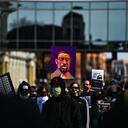 Demonstrators participate in the �I Can�t Breathe - Silent March for Justice� in front of the Hennepin County Government Center on March 7, 2021, where the trial of former Minneapolis police officer Derek Chauvin, charged with murdering African American man George Floyd, will begin on March 8, 2021, in Minneapolis, Minnesota. - His name is chanted by demonstrators around the globe. His face is displayed on murals all over the United States. Since his brutal death George Floyd has embodied, more than any other, the Black victims of police violence and racism in the United States. (Photo by CHANDAN KHANNA / AFP)