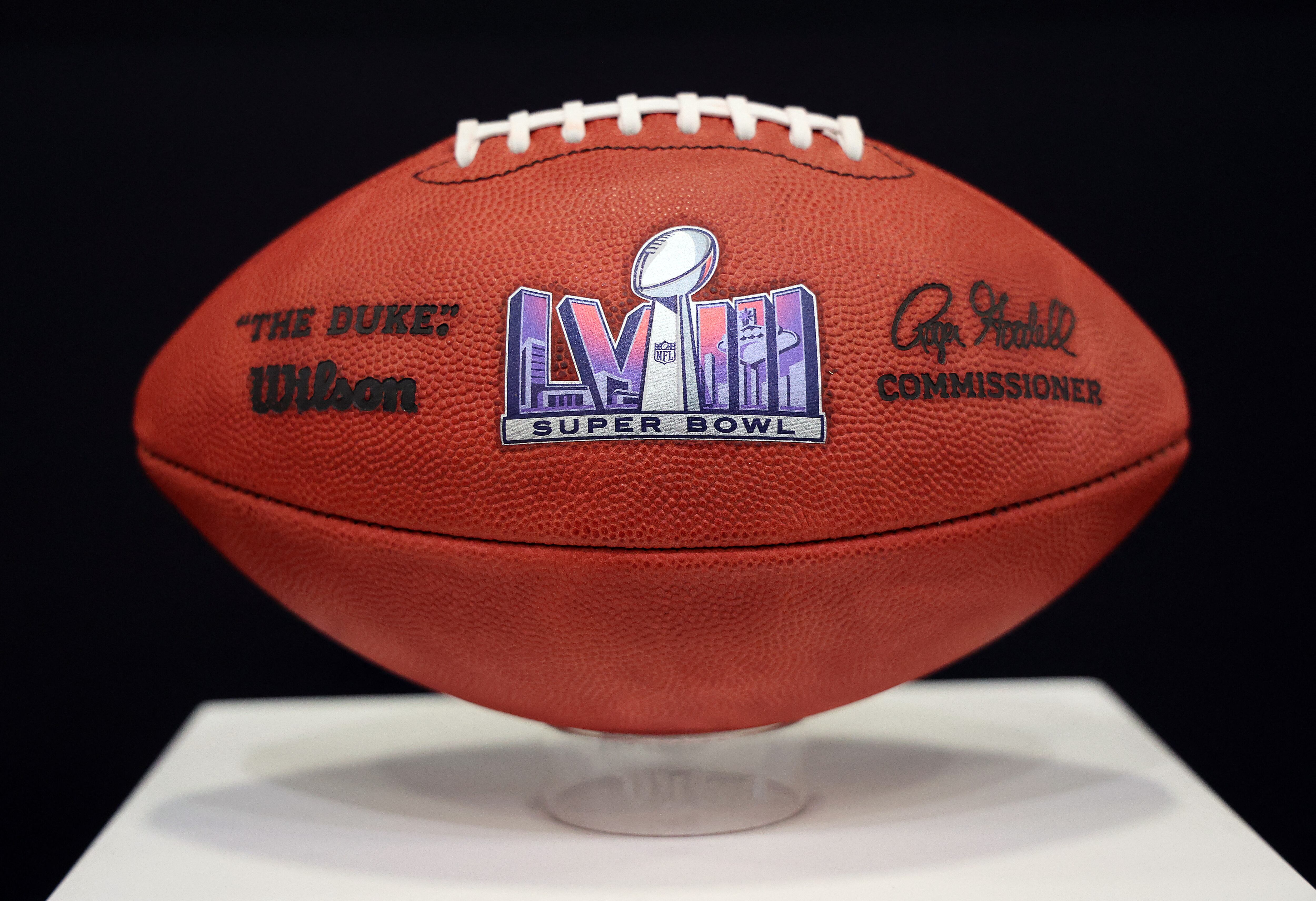 LAS VEGAS, NEVADA - FEBRUARY 06: A general view of official logo footballs displayed in the NFL Super Bowl Experience ahead of Super Bowl LVIII on February 06, 2024 in Las Vegas, Nevada. Jamie Squire/Getty Images/AFP (Photo by JAMIE SQUIRE / GETTY IMAGES NORTH AMERICA / Getty Images via AFP)