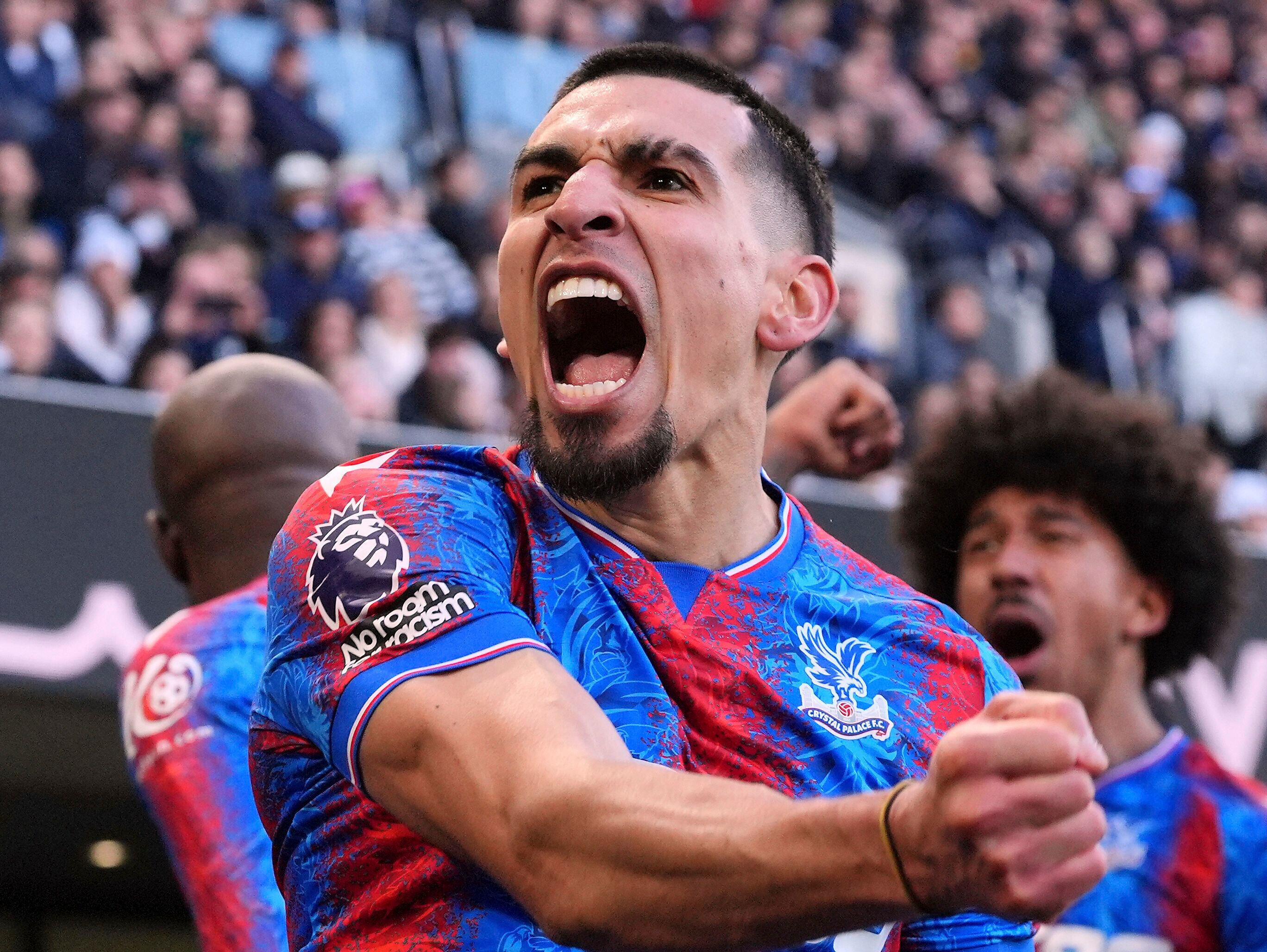 Crystal Palace's Daniel Munoz celebrates scoring their side's second goal of the game during the Premier League soccer match between Fulham and Crystal Palace at Craven Cottage in London, Saturday, Feb. 22, 2025.  ( Jonathan Brady/PA via AP)