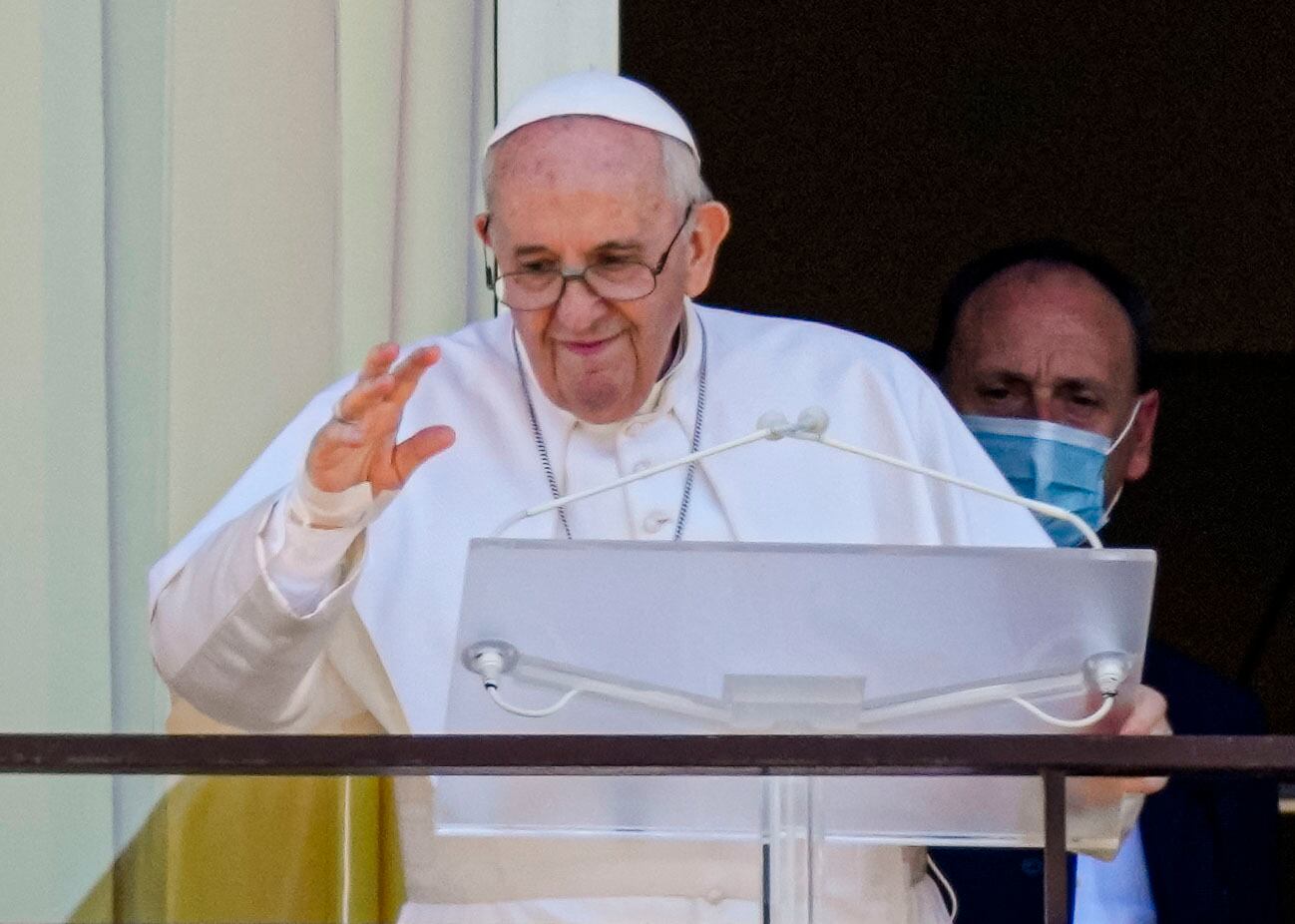 Pope Francis appears on a balcony of the Agostino Gemelli Polyclinic in Rome, Sunday, July 11, 2021, where he is recovering from intestinal surgery, for the traditional Sunday blessing and Angelus prayer. Pope Francis is 84 and had a part of his colon removed a week ago. (AP Photo/Alessandra Tarantino)