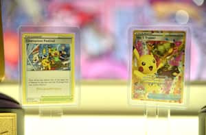 LONDON, ENGLAND - AUGUST 18: The Pikachu Pokemon winners cards are displayed during the 2022 Pokémon World Championships at ExCel on August 18, 2022 in London, England. For the first time in history, the championship event is being held outside of North America, London Excel will host the competition on August 18–21. Some of the best Pokémon players from around the will compete in Pokémon TCG, the Pokémon Sword and Pokémon Shield video games, Pokémon GO, Pokémon UNITE, and Pokkén Tournament DX. Half a million dollars in prizes, the title of Pokémon World Champion, and return invitations for the following year's Worlds are up for grabs. (Photo by John Keeble/Getty Images)