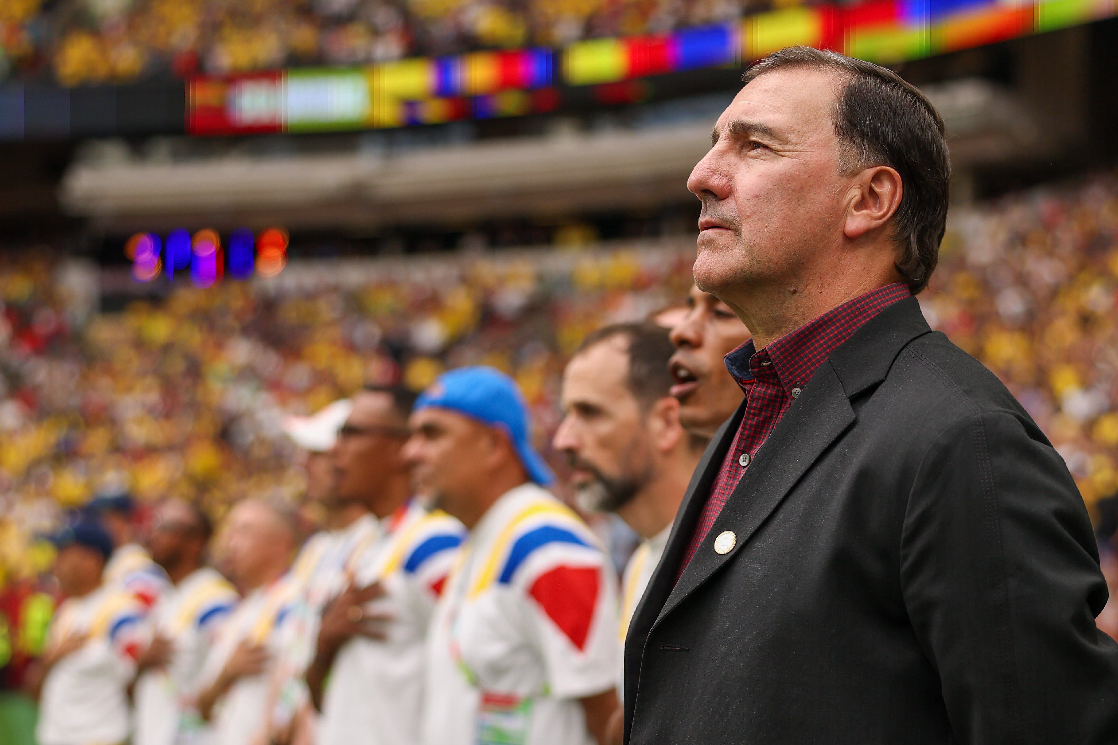 VANCOUVER, CANADA - JULY 07: Nestor Lorenzo, Head Coach of Colombia, lines up for the national anthem before the FIFA World Cup 2026 Round of 16 match between Switzerland and Colombia at BC Place Vancouver on July 07, 2026 in Vancouver, British Columbia, Canada. (Photo by Alex Pantling - FIFA/FIFA via Getty Images)