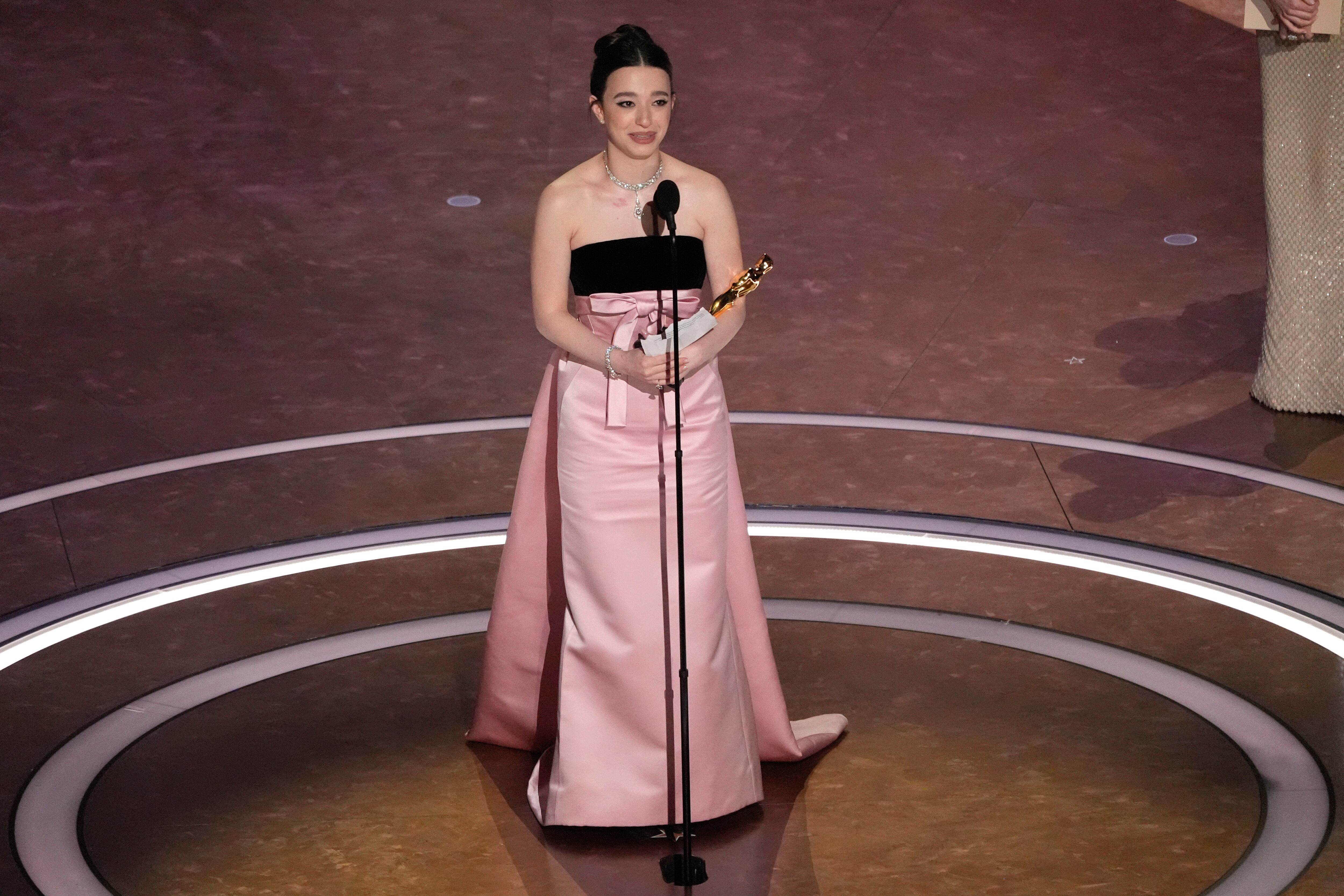 Mikey Madison accepts the award for best performance by an actress in a leading role for "Anora" during the Oscars on Sunday, March 2, 2025, at the Dolby Theatre in Los Angeles. (AP Photo/Chris Pizzello)