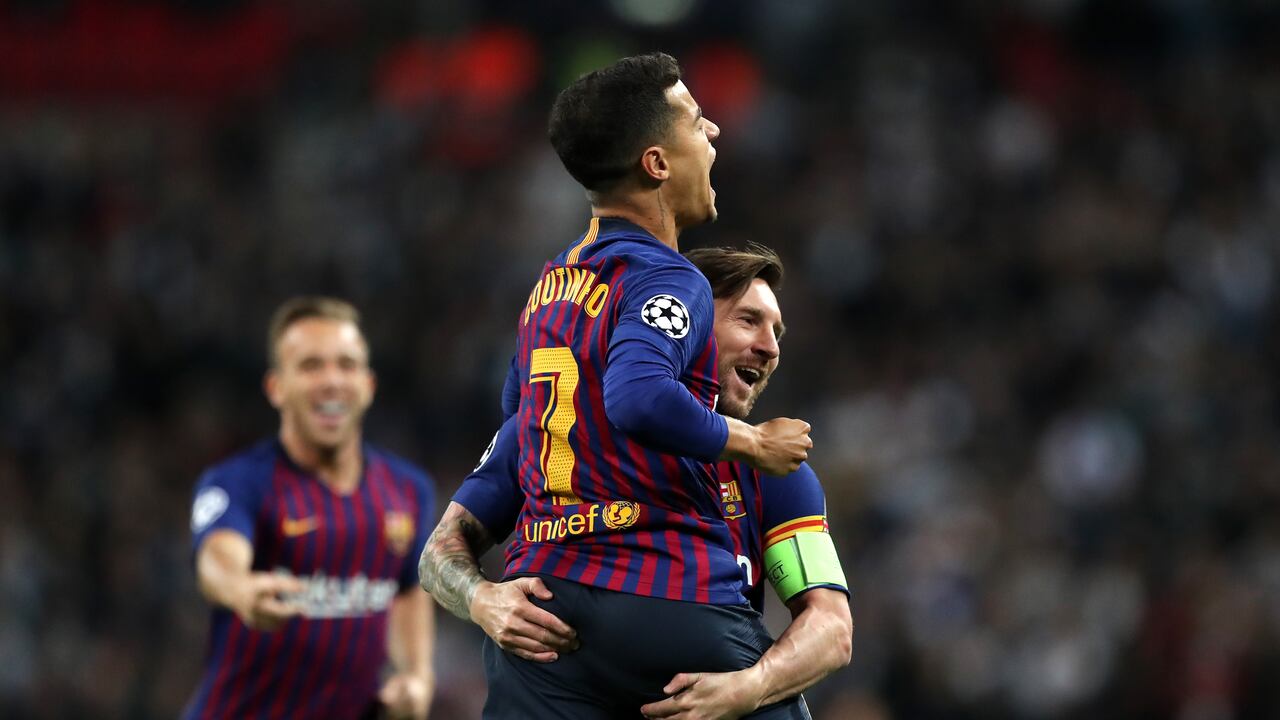 Philippe Coutinho y Lionel Messi.