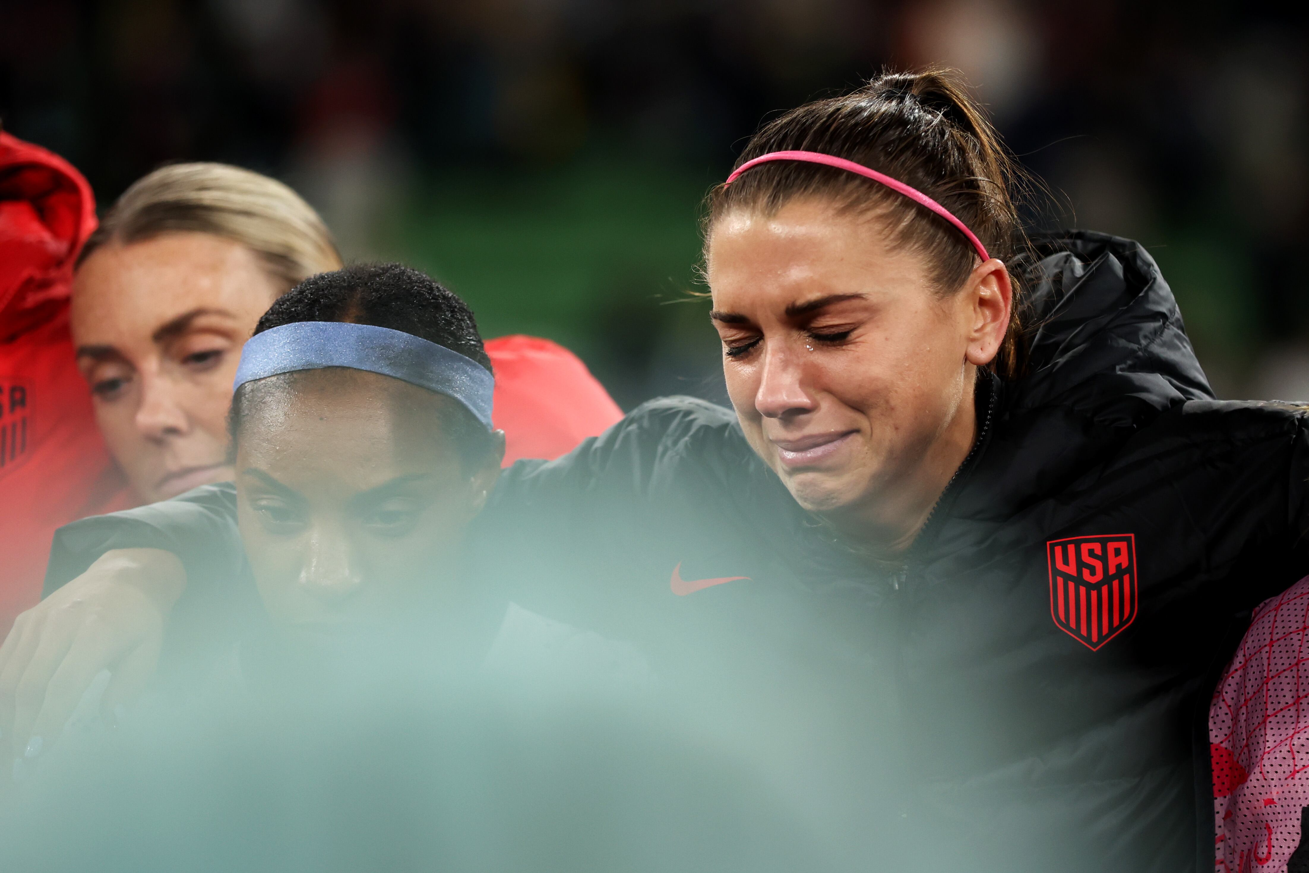 MELBOURNE, AUSTRALIA - AUGUST 06: Alex Morgan of USA is seen crying as she reacts to her team being knocked out of the tournament after a penalty shoot out loss during the FIFA Women's World Cup Australia & New Zealand 2023 Round of 16 match between Sweden and USA at Melbourne Rectangular Stadium on August 06, 2023 in Melbourne / Naarm, Australia. (Photo by Alex Pantling - FIFA/FIFA via Getty Images)