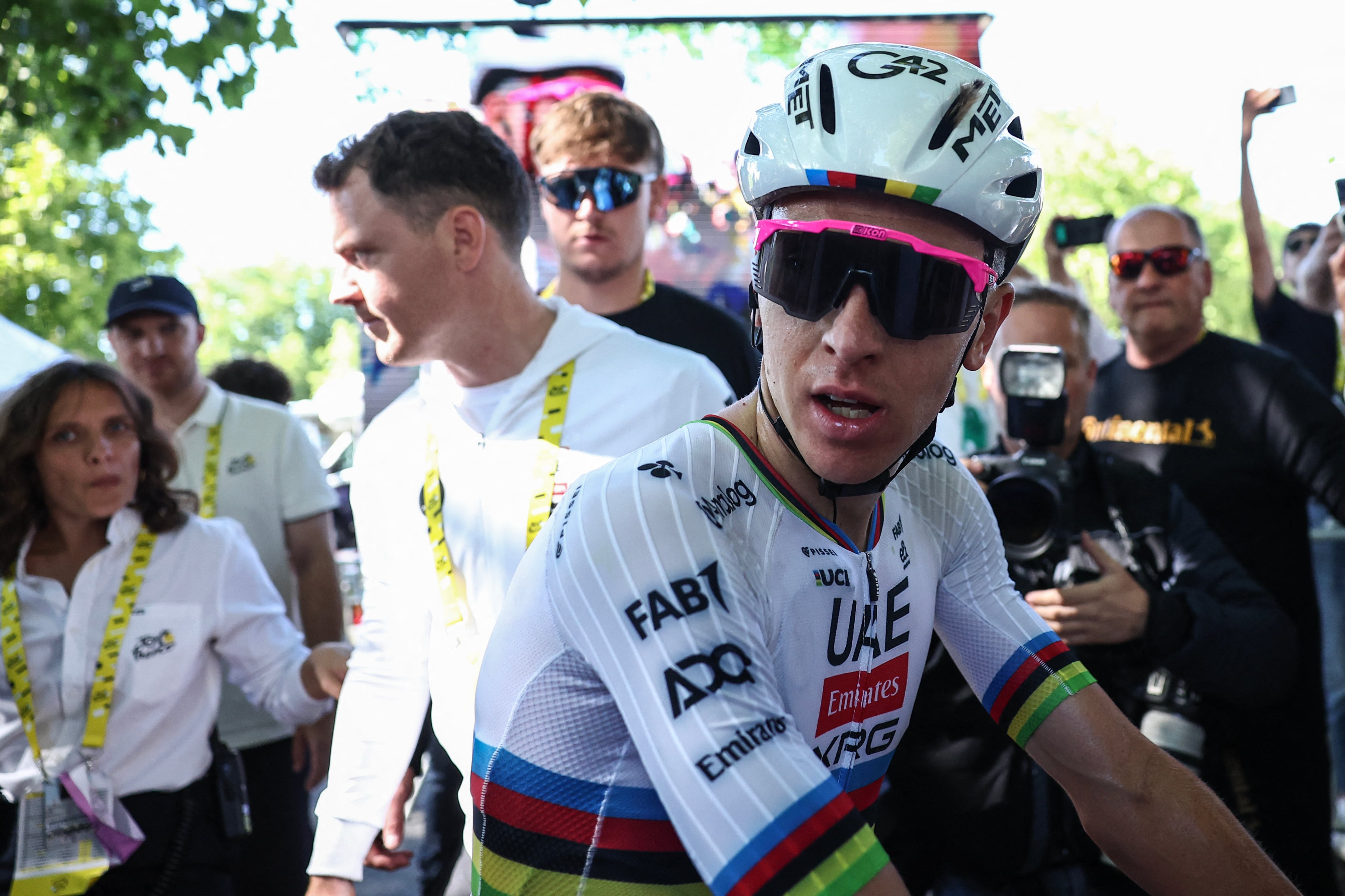 UAE Team Emirate - XRG team's Slovenian rider Tadej Pogacar celebrates after winning the 4th stage of the 112th edition of the Tour de France cycling race, 174.2 km between Amiens Metropole and Rouen, Northern France, on July 8, 2025. (Photo by Anne-Christine POUJOULAT / POOL / AFP)