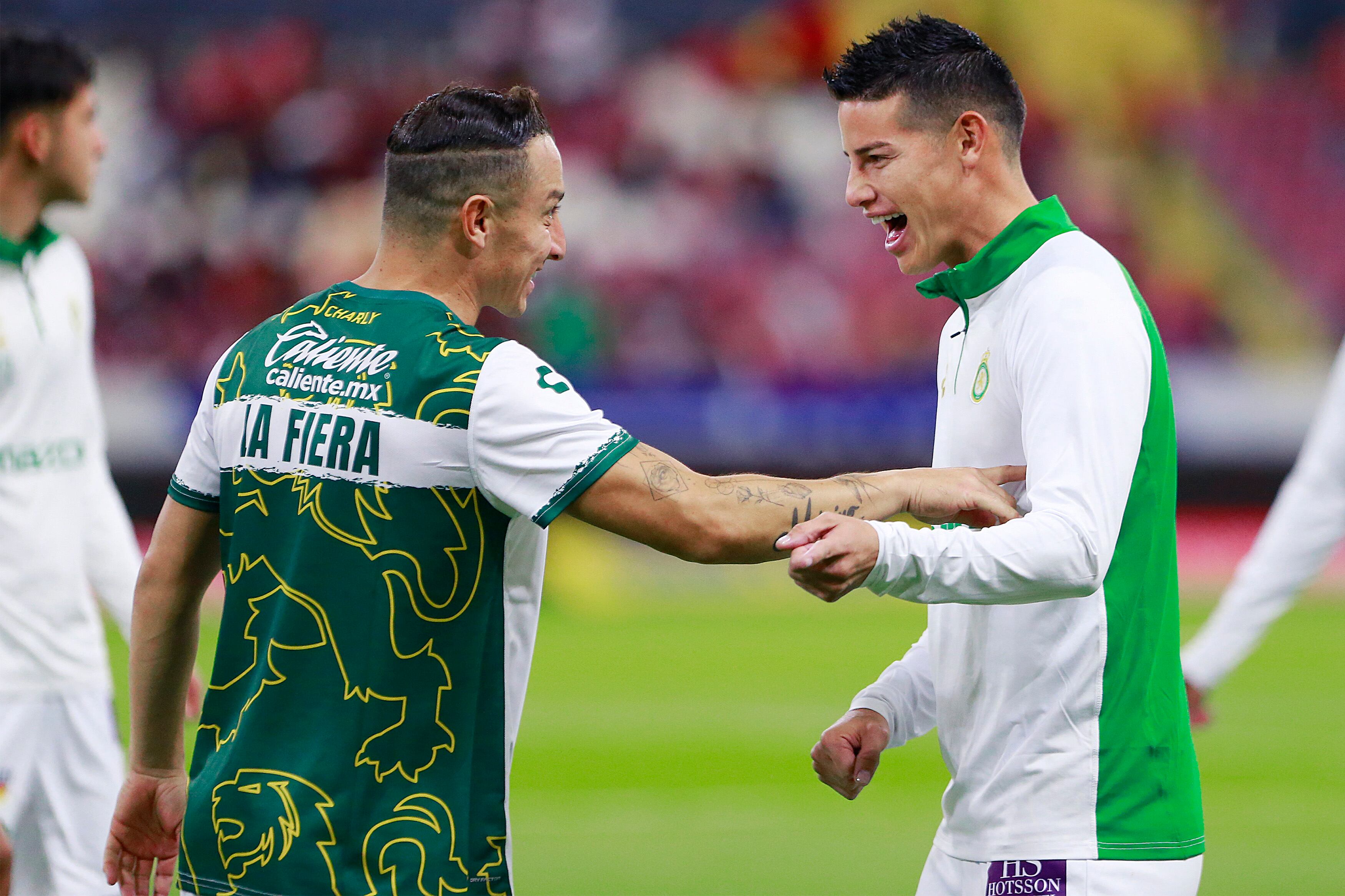 GUADALAJARA, MEXICO - JANUARY 18: Andres Guardado (L) and James Rodriguez (R) of Leon smile prior to the 2nd round match between Atlas and Leon as part of the Torneo Clausura 2025 Liga MX at Estadio Jalisco on January 18, 2025 in Guadalajara, Mexico. (Photo by Alfredo Moya/Jam Media/Getty Images)
