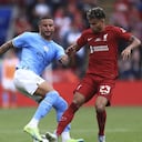 Liverpool's Luis Diaz, right, fights for the ball with Manchester City's Kyle Walker during the FA Community Shield soccer match between Liverpool and Manchester City at the King Power Stadium in Leicester, England, Saturday, July 30, 2022. (AP Photo/Leila Coker)