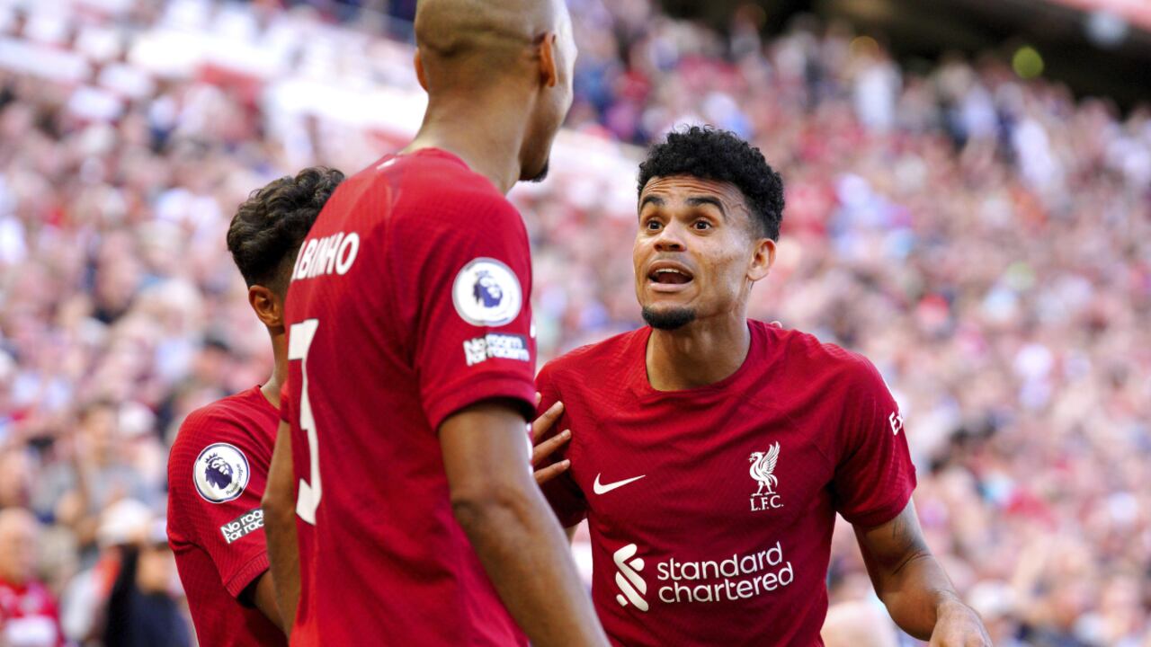 Liverpool's Luis Diaz, right, celebrates scoring their side's ninth goal of the game during the English Premier League match between Liverpool and Bournemouth at Anfield stadium in Liverpool, England, Saturday Aug. 27, 2022. (AP/Peter Byrne/PA