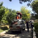 Afghans carry the dead body of an Afghan at a hospital in Kabul, Afghanistan, Friday, Aug. 27, 2021, a day after deadly attacks outside the airport. Two suicide bombers and gunmen attacked crowds of Afghans flocking to Kabul's airport Thursday, transforming a scene of desperation into one of horror in the waning days of an airlift for those fleeing the Taliban takeover. (AP Photo/Wali Sabawoon)
