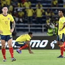 BARRANQUILLA, COLOMBIA - JANUARY 28: James Rodríguez of Colombia (L) reacts after losing a match between Colombia and Peru as part of FIFA World Cup Qatar 2022 Qualifiers at Roberto Melendez Metropolitan Stadium on January 28, 2022 in Barranquilla, Colombia. (Photo by Gabriel Aponte/Getty Images)