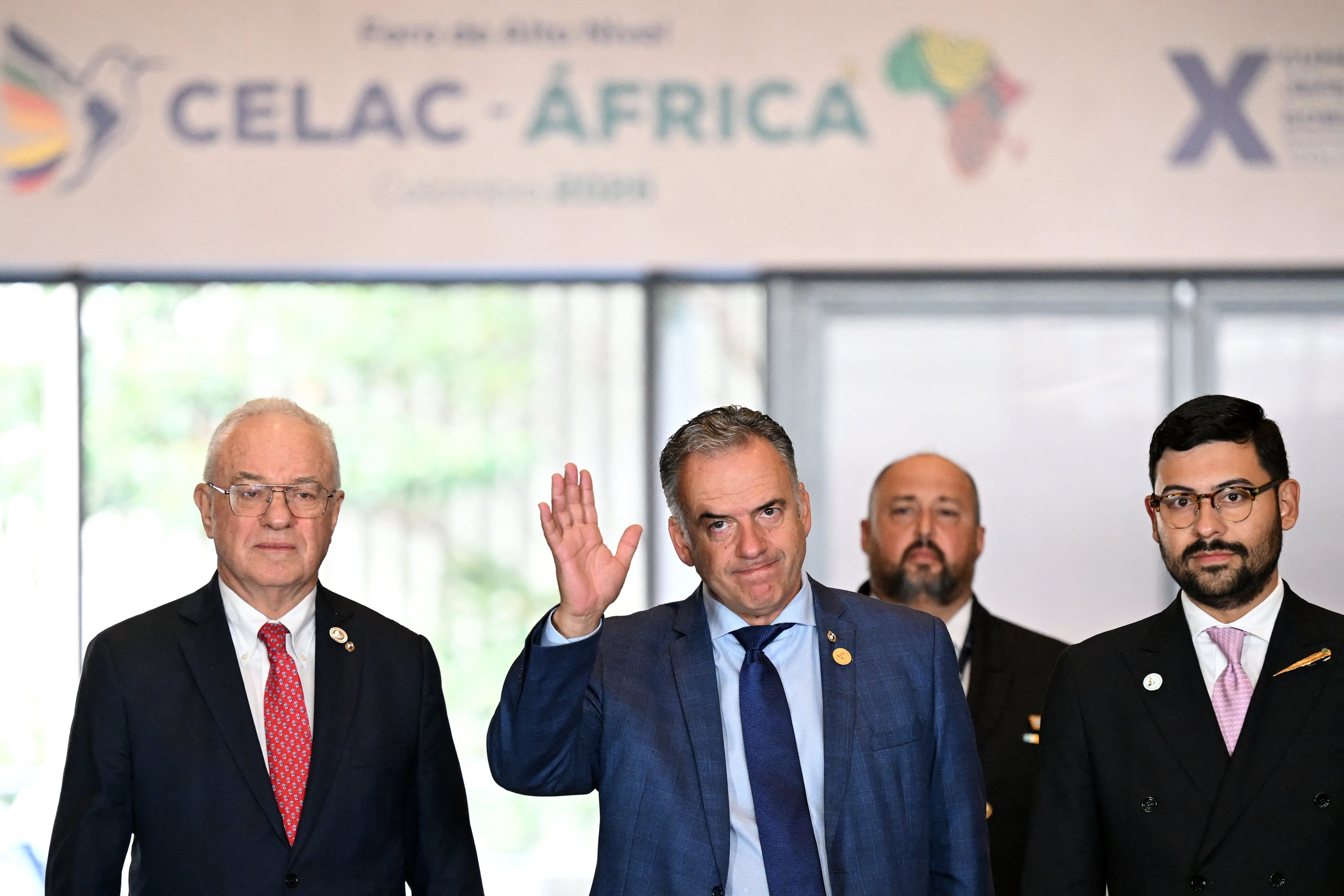 Uruguay's President Yamandu Orsi (C) and Uruguay's Foreign Minister Mario Lubetkin (L) arrive for the X Summit of Heads of State and Government, within the framework of the CELAC-Africa High-Level Forum in Bogota on March 21, 2026. (Photo by RAUL ARBOLEDA / AFP)