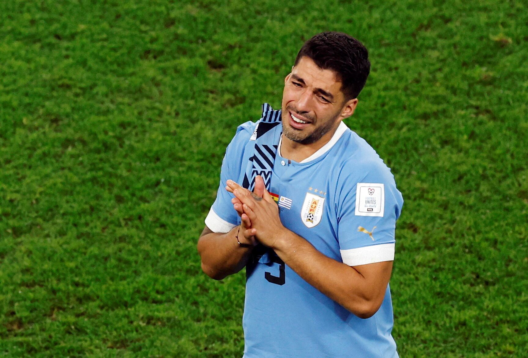 Soccer Football - FIFA World Cup Qatar 2022 - Group H - Ghana v Uruguay - Al Janoub Stadium, Al Wakrah, Qatar - December 2, 2022 Uruguay's Luis Suarez looks dejected after the match as Uruguay are eliminated from the World Cup REUTERS/Albert Gea     TPX IMAGES OF THE DAY