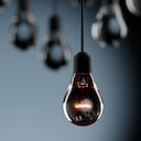 3D render close up light bulb art conceptual on color background