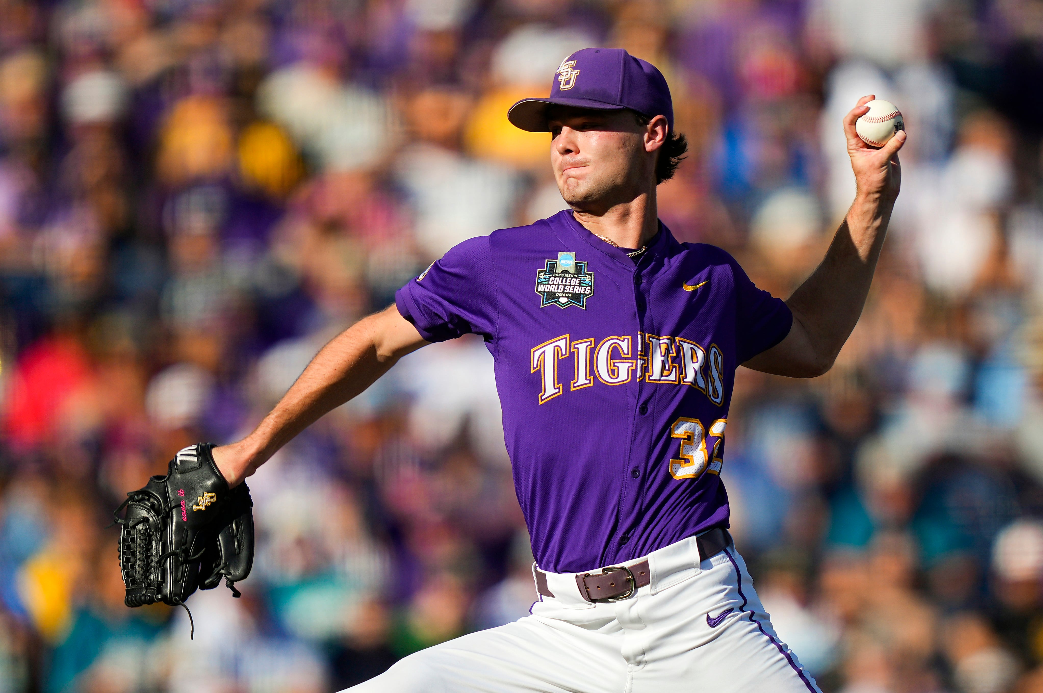 OMAHA, NEBRASKA - JUNE 21: Kade Anderson #32 of the LSU Tigers pitches during the first inning against the Coastal Carolina Chanticleers at Charles Schwab Field on June 21, 2025 in Omaha, Nebraska.  (Photo by Jay Biggerstaff/Getty Images)