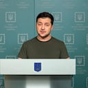 In this photo taken from video provided by the Ukrainian Presidential Press Office, Ukrainian President Volodymyr Zelenskyy speaks to the nation in Kyiv, Ukraine, Sunday, Feb. 27, 2022. Street fighting broke out in Ukraine's second-largest city Sunday and Russian troops put increasing pressure on strategic ports in the country's south following a wave of attacks on airfields and fuel facilities elsewhere that appeared to mark a new phase of Russia's invasion. (Ukrainian Presidential Press Office via AP)