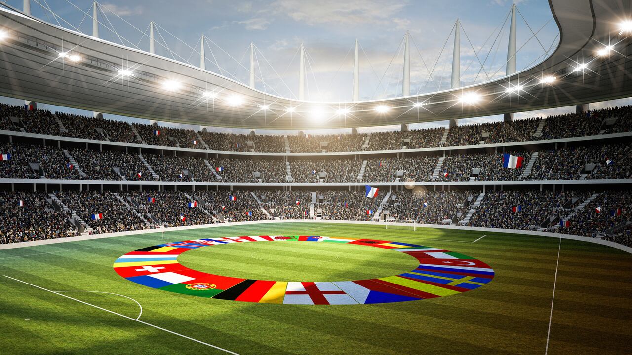Representación 3D de un estadio de fútbol con banderas europeas en el campo de juego