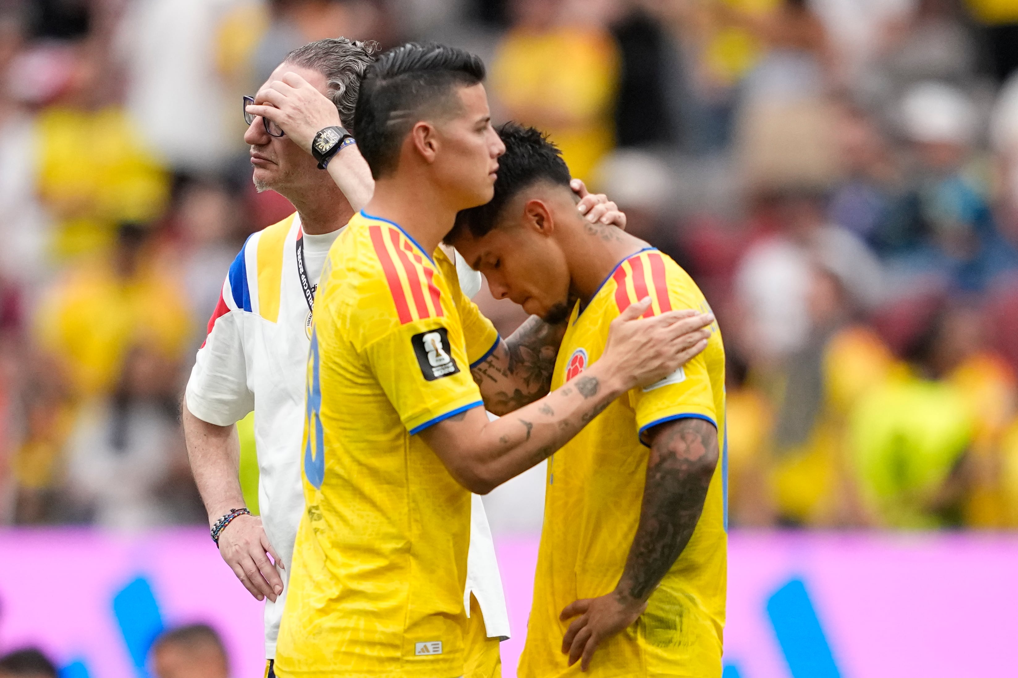 Colombia's James Rodríguez, left, and Cucho Hernández react after losing a penalty shootout against Switzerland in the World Cup round of 16 soccer match between Switzerland and Colombia in Vancouver, British Columbia, Tuesday, July 7, 2026. (AP Photo/Lindsey Wasson)
