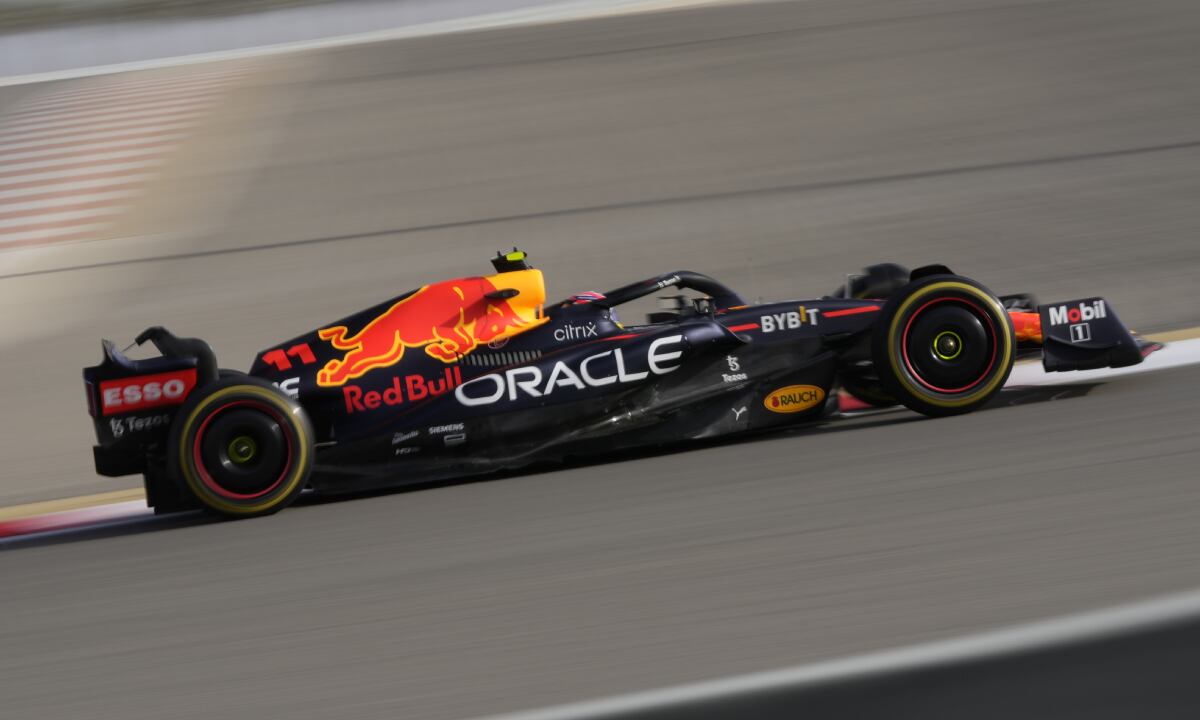 Red Bull driver Sergio Perez of Mexico steers his car during a practice for theFormula One Bahrain Grand Prix it in Sakhir, Bahrain, Friday, March 18, 2022. (AP/Hassan Ammar)