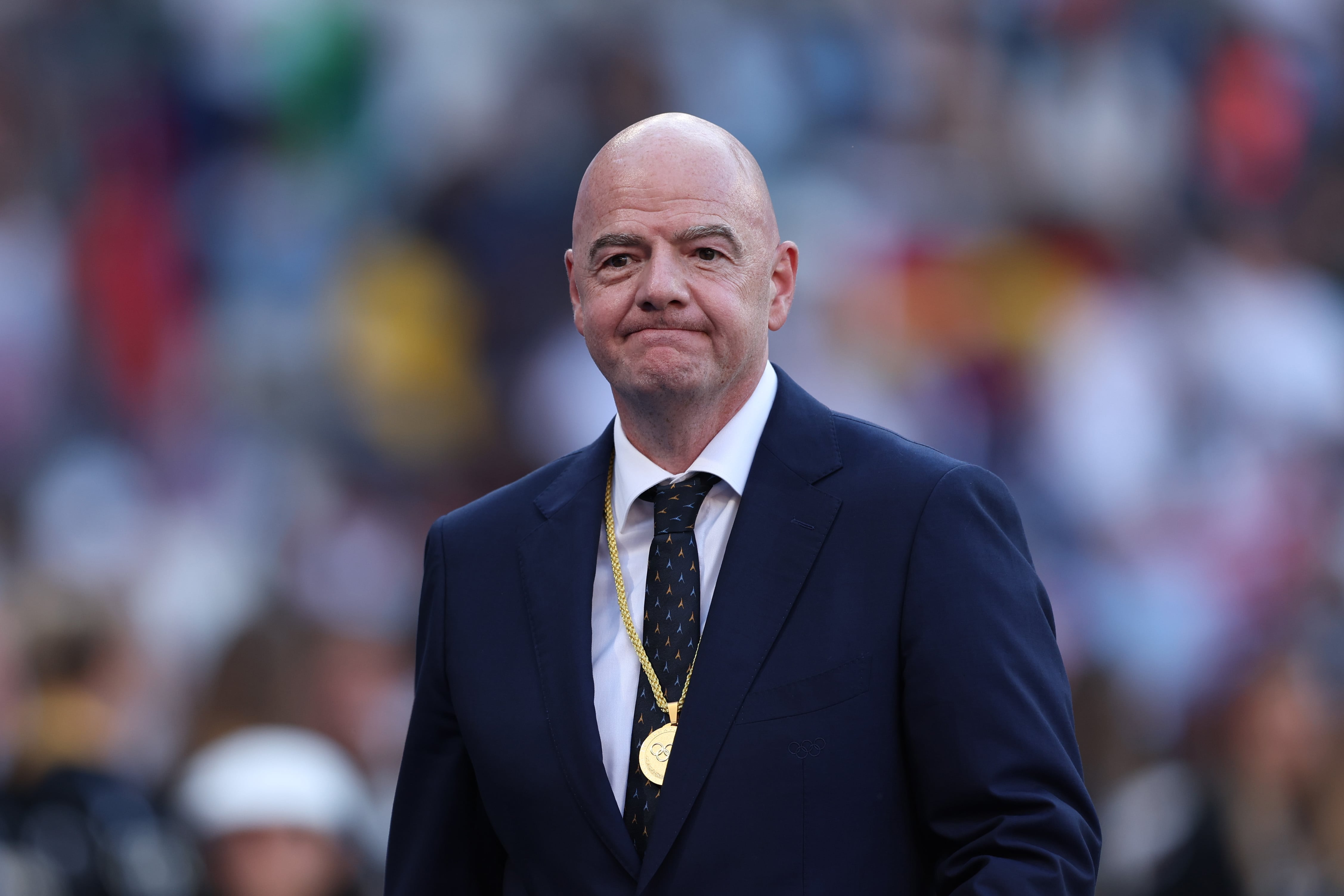 PARIS, FRANCE - AUGUST 10: Gianni Infantino, President of FIFA, reacts during the Women's Football medal ceremony following the Women's Gold Medal match between Brazil and United States of America during the Olympic Games Paris 2024 at Parc des Princes on August 10, 2024 in Paris, France. (Photo by Justin Setterfield/Getty Images)