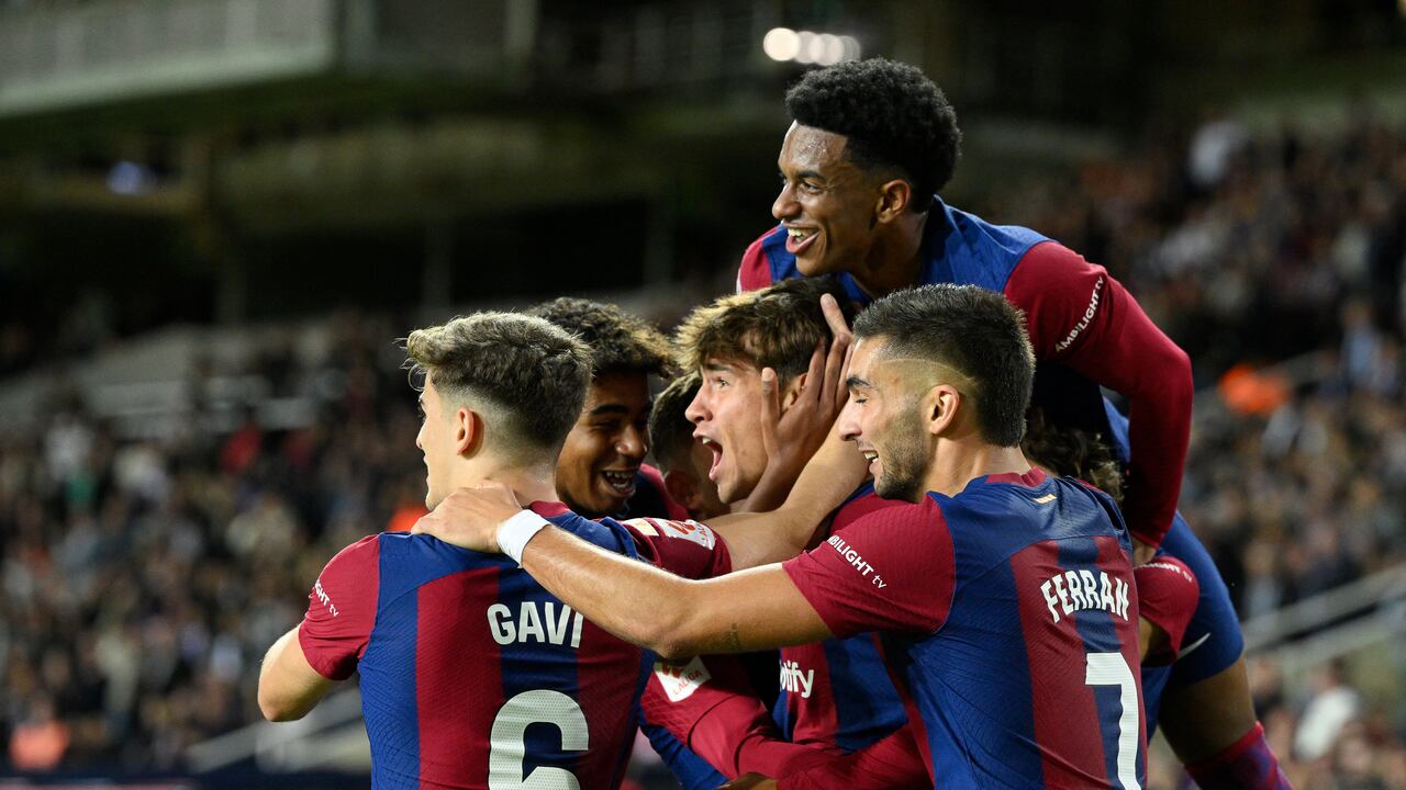 Jugadores del Barcelona (Photo by Josep LAGO / AFP)