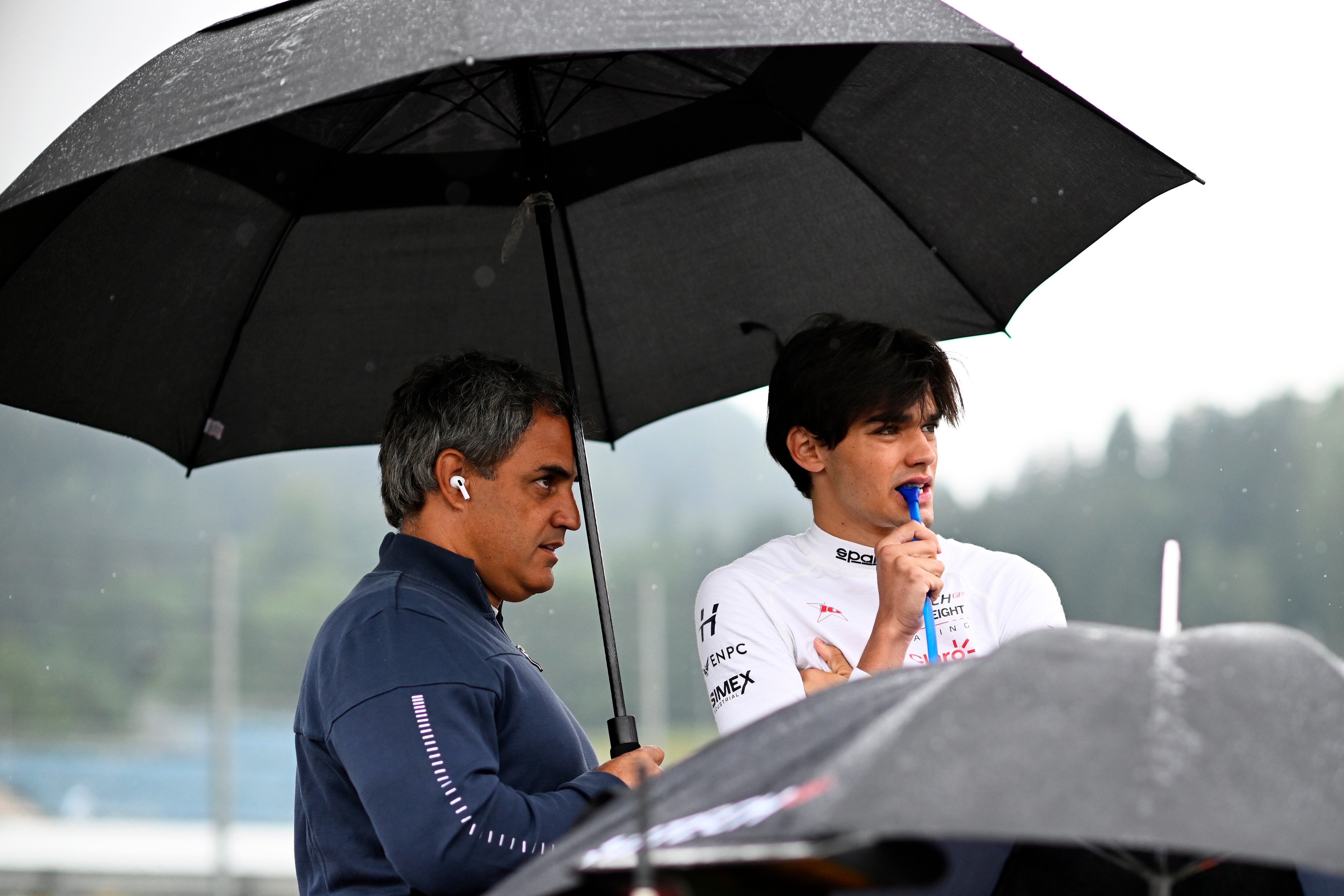 SPIELBERG, AUSTRIA - JULY 01: Sebastian Montoya of Colombia and Hitech Pulse-Eight (14) and Juan Pablo Montoya look on during the Round 6:Spielberg Sprint race of the Formula 3 Championship at Red Bull Ring on July 01, 2023 in Spielberg, Austria. (Photo by Rudy Carezzevoli - Formula 1/Formula Motorsport Limited via Getty Images)