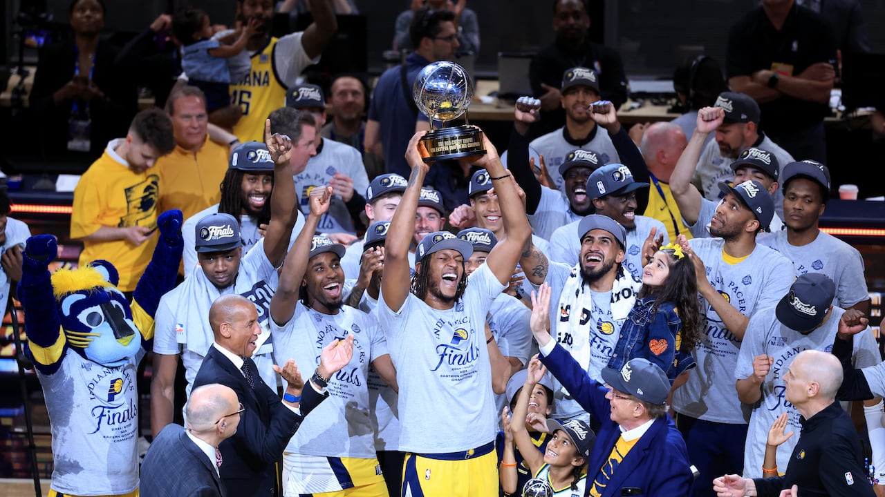INDIANAPOLIS, INDIANA - MAY 31: Myles Turner #33 of the Indiana Pacers celebrates with the Bob Cousy Trophy after the 125-108 win against the New York Knicks in Game Six of the Eastern Conference Finals of the 2025 NBA Playoffs at Gainbridge Fieldhouse on May 31, 2025 in Indianapolis, Indiana. NOTE TO USER: User expressly acknowledges and agrees that, by downloading and or using this photograph, User is consenting to the terms and conditions of the Getty Images License Agreement. (Photo by Justin Casterline/Getty Images)