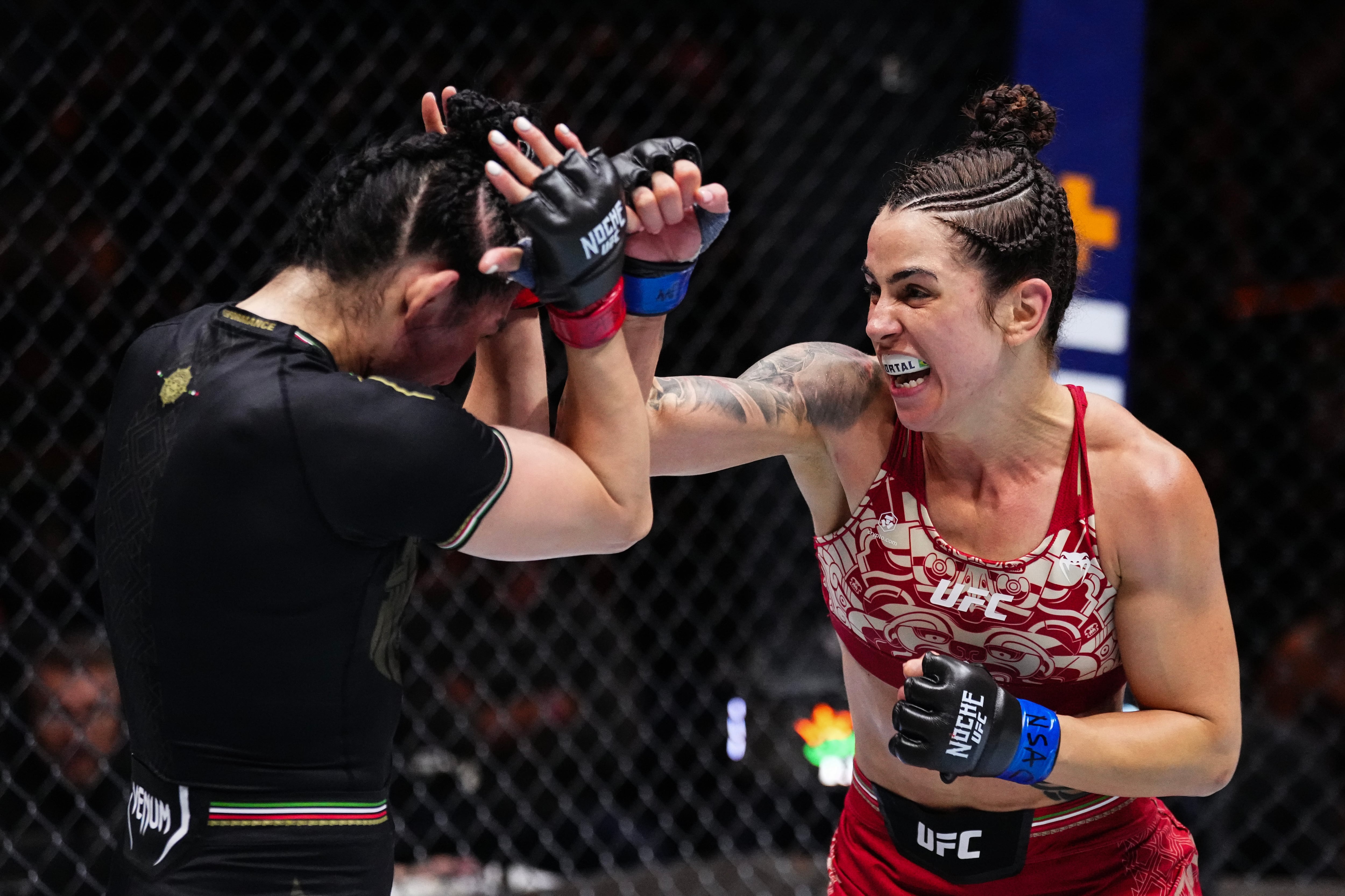 LAS VEGAS, NEVADA - SEPTEMBER 14: (R-L) Norma Dumont of Brazil strikes Irene Aldana of Mexico in a bantamweight fight during the UFC 306 at Riyadh Season Noche UFC event at Sphere on September 14, 2024 in Las Vegas, Nevada. (Photo by Jeff Bottari/Zuffa LLC)