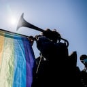 ISTANBUL, TURKEY - 2021/03/27: A protester seen playing a trombone draped in an LGBTI+ flag during the demonstration.
Bosphorus University students staged yet another protest in Istanbul against the appointment of a governing party member as their rector by President Recep Tayyip Erdogan. (Photo by Murat Baykara/SOPA Images/LightRocket via Getty Images)