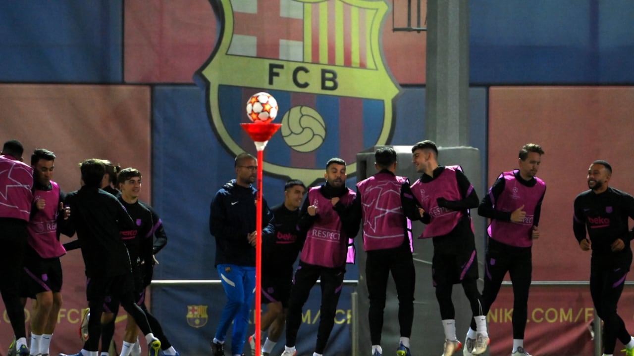 Barcelona's players take part in a training session at the Camp Nou stadium in Barcelona on November 22, 2021,on the eve of their UEFA Champions League Group E football match against SL Benfica.
AFP/LLUIS GENE