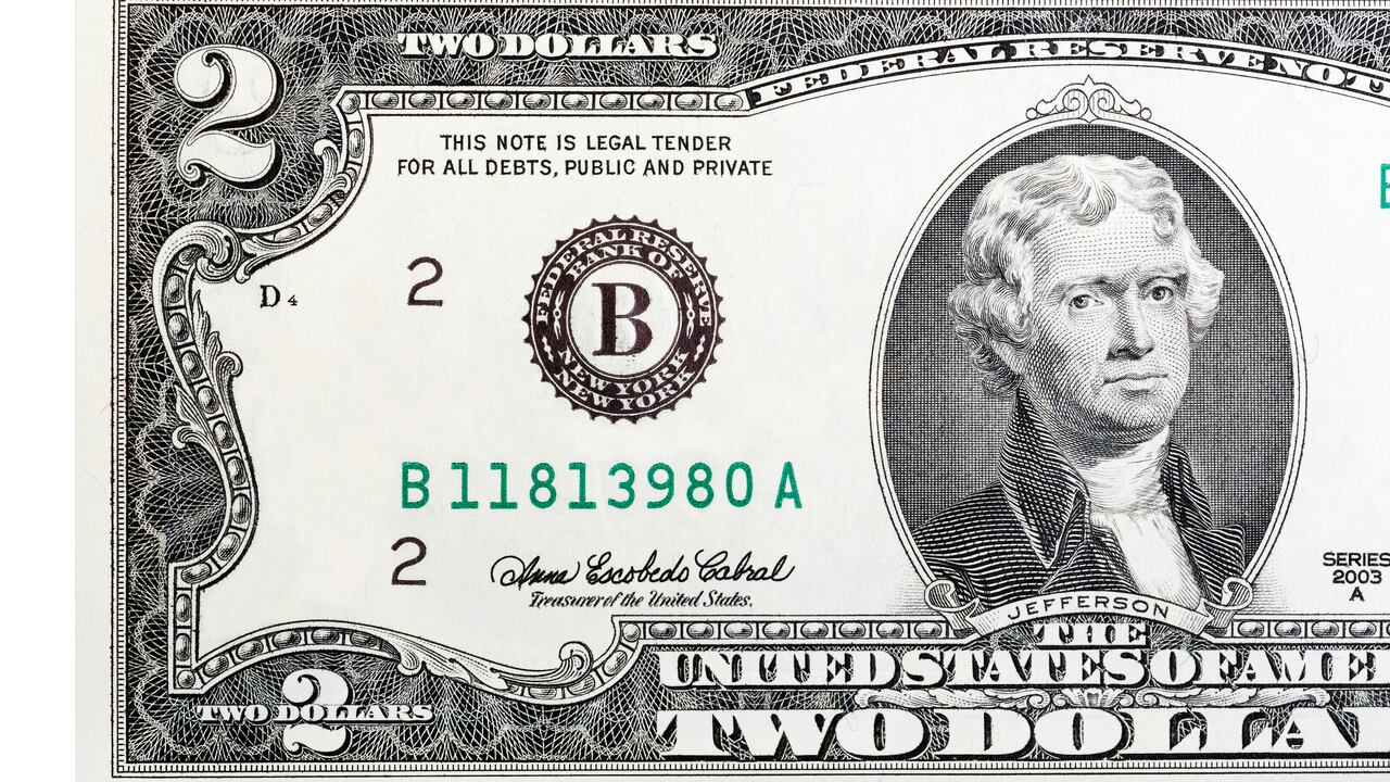 A close-up of a two U.S. dollar bill. Isolated. High resolution photo.
