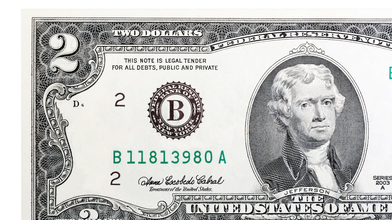 A close-up of a two U.S. dollar bill. Isolated. High resolution photo.